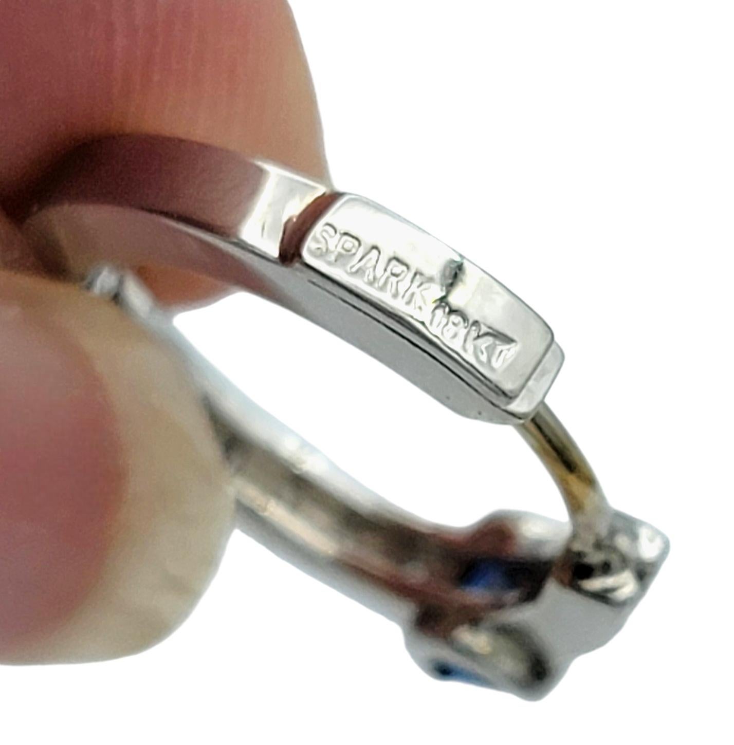 Women's Spark Creations Diamond and Blue Sapphire Huggie Hoops in 18 Karat White Gold