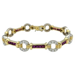 Spark Creations Gliederarmband aus 18 Karat Gelbgold mit Rubin und Diamanten