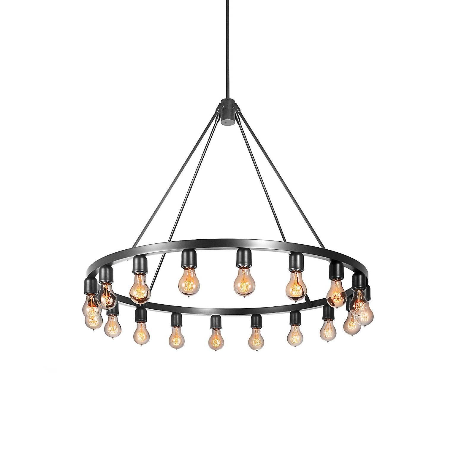 The Spark Chandelier celebrates minimal design, emphasizing the elegance of exposed bulbs. This chic-meets-industrial fixture creates welcome intrigue in any setting with its assortment of vintage-style lamping options, which can be oriented in