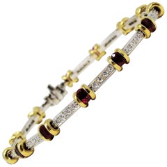 Bracelet station en or jaune/blanc 18 carats avec rubis et diamants scintillants