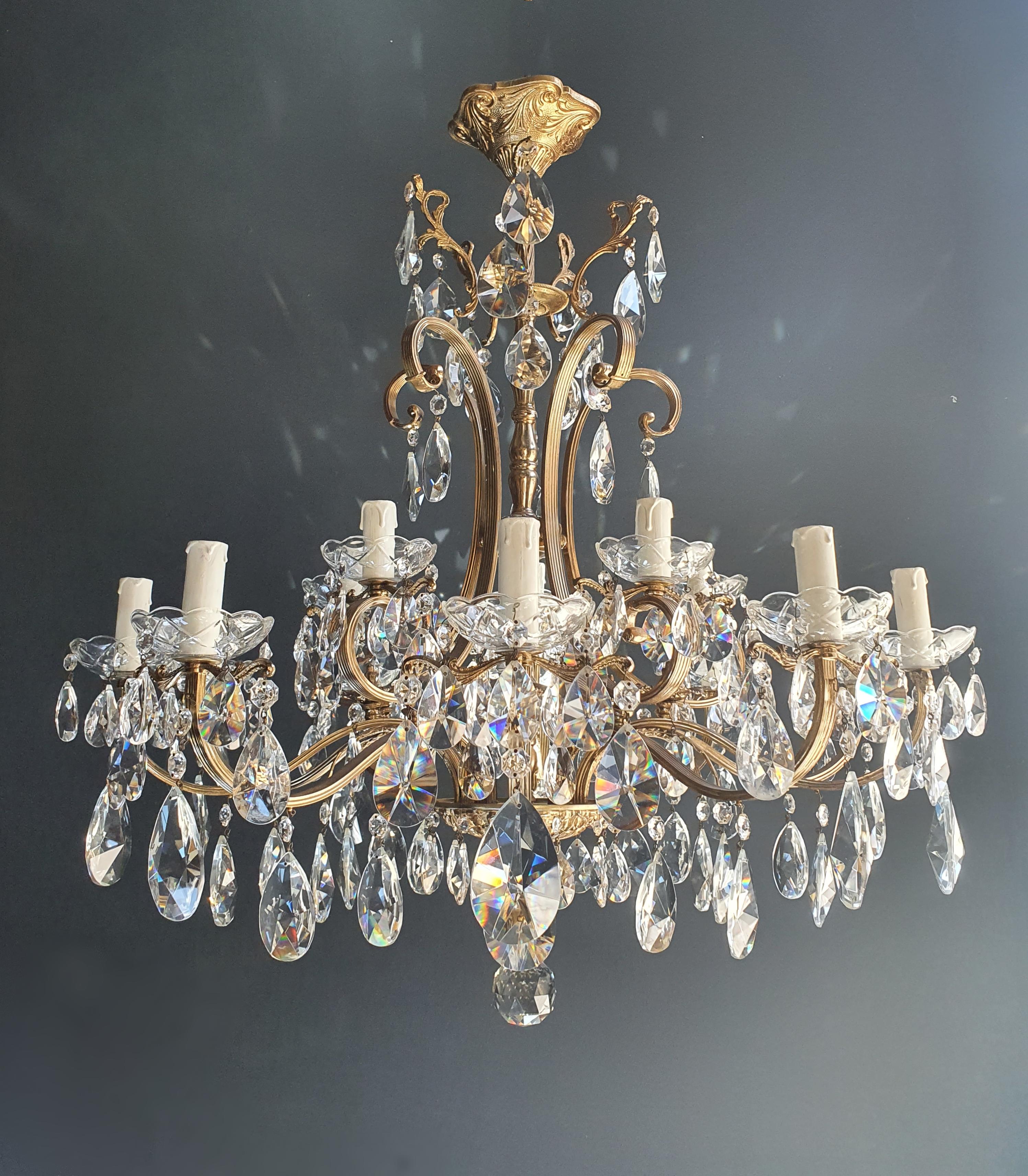 Sparkle crystal brass candelabrum antique chandelier ceiling lustre Art Nouveau

Measures: Total height 88 cm, height without chain 88 cm, diameter 80 cm. Weight (approximately): 15 kg.

Number of lights: 15-light bulb sockets: E14 material: Cut