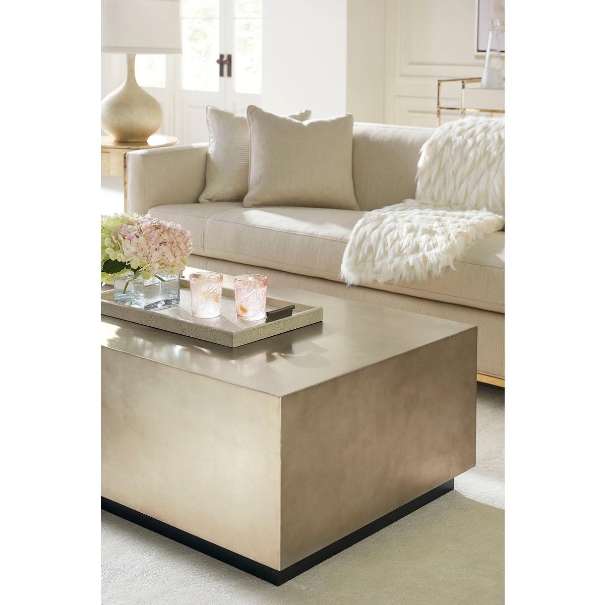 A 60-inch by 30-inch cocktail table will work anywhere that calls for a little refined elegance. A Taupe Silver Leaf finish has a hint of sparkle and the fade-away black base in Almost Black secures this design in place. 

Dimensions: 60