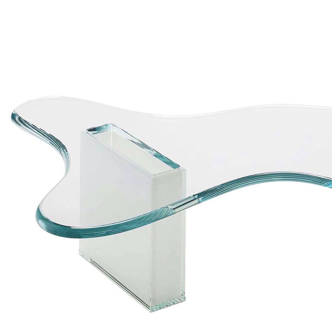 Coffee table sparkle white XL with clear glass top, 
with rounded edges 20mm thickness. With 2 glass 
box bases in white glass, with edges of 12mm thickness.
L140xD83xH33cm, price: 4450,00€.
Also available in L107xD87xH33cm, price: 4300,00€
Also