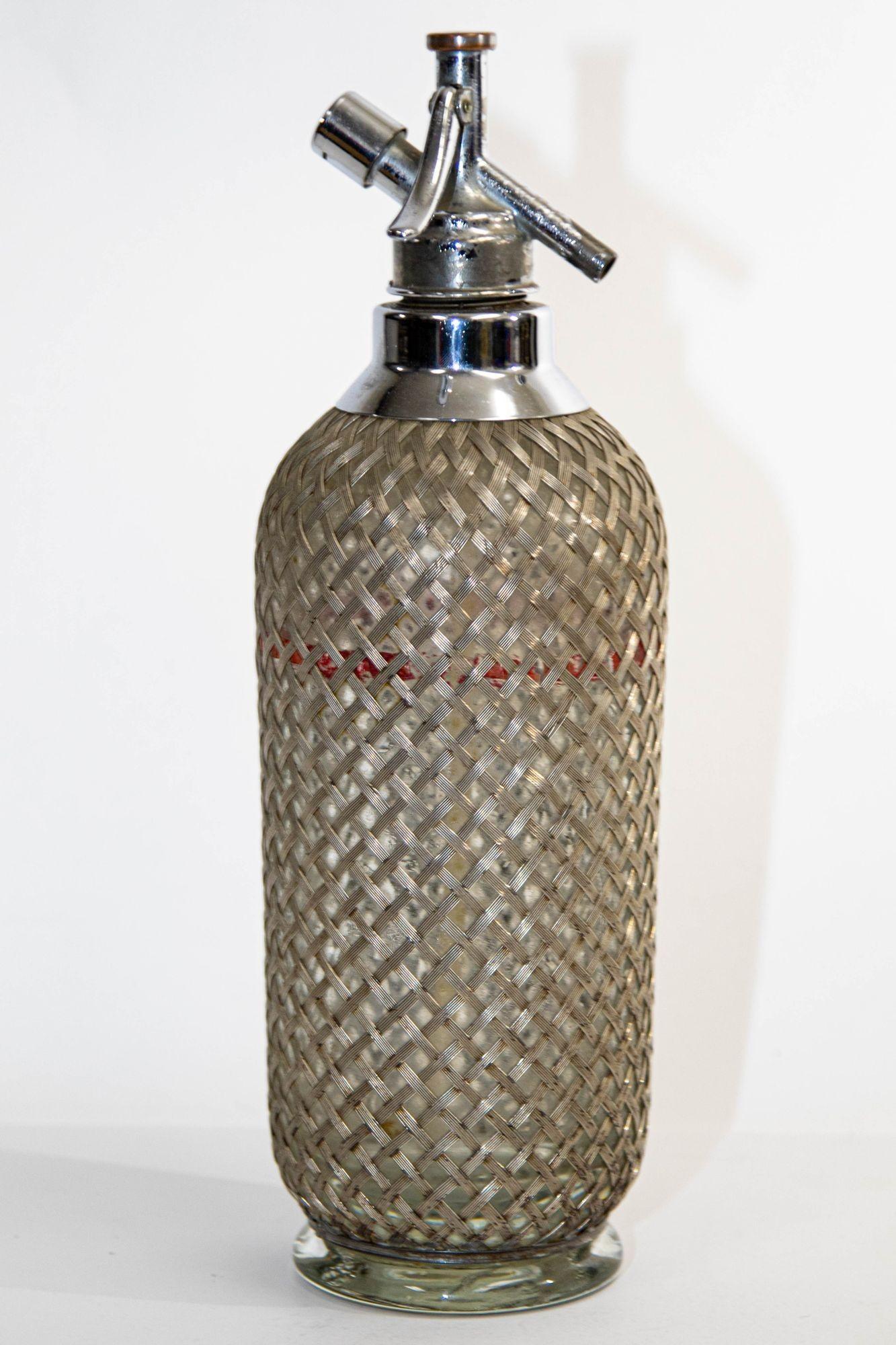 Antique Art Deco Sparklet Seltzer Bottle Mesh Wire Siphon Barware.
Antique Original Sparklets Makers London 1930s Mesh Soda Syphon, Retro Collectable Barware, Vintage Glass Seltzer Siphon.
Fabulous, very hard to find, Sparklest London antique soda