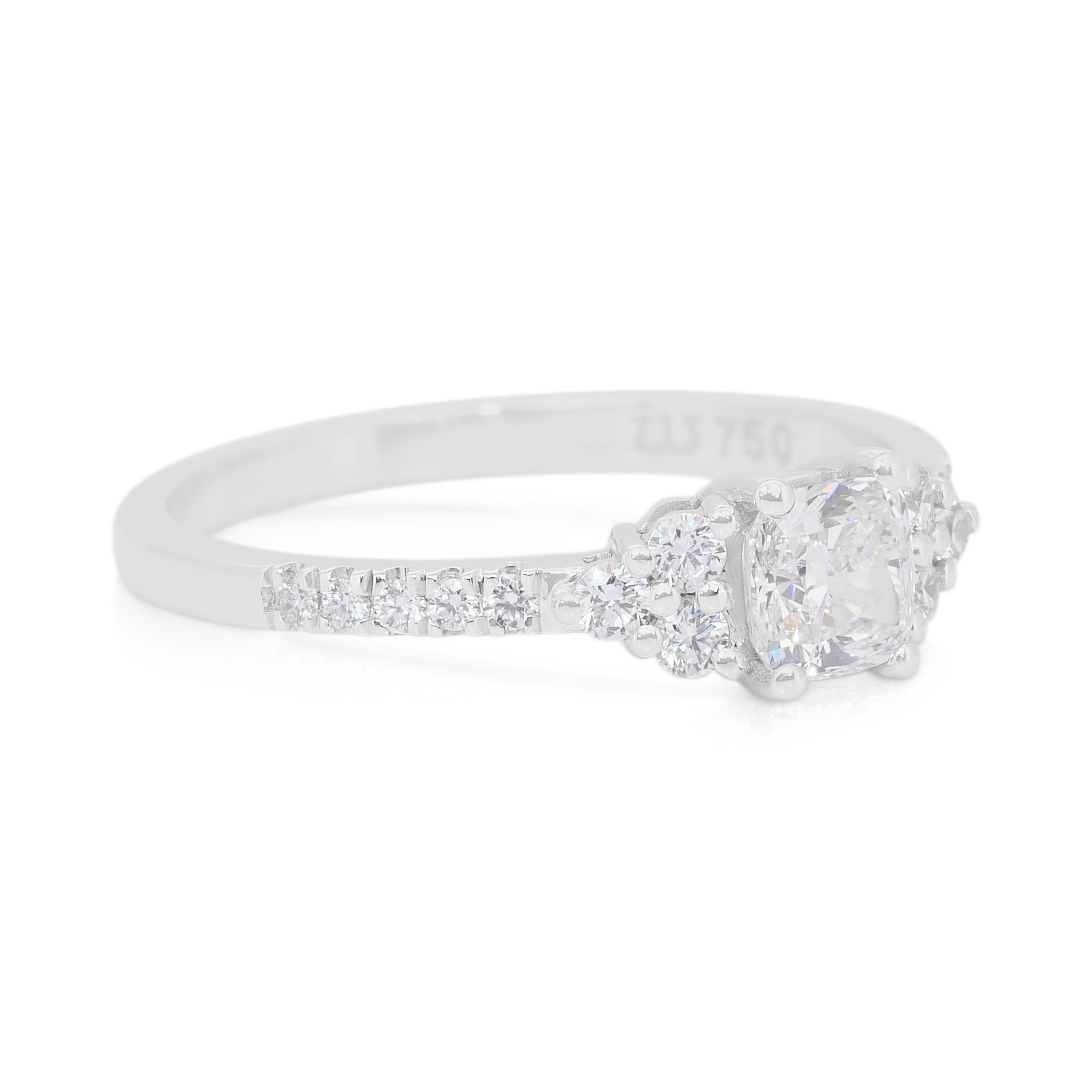 Sparkling 0.79ct Diamonds Ring in 18k White Gold - GIA Certified

Crafted for those who adore subtle sophistication, this 18K white gold ring features a stunning 0.54ct cushion-cut diamond. GIA certified for guaranteed quality, its beauty is
