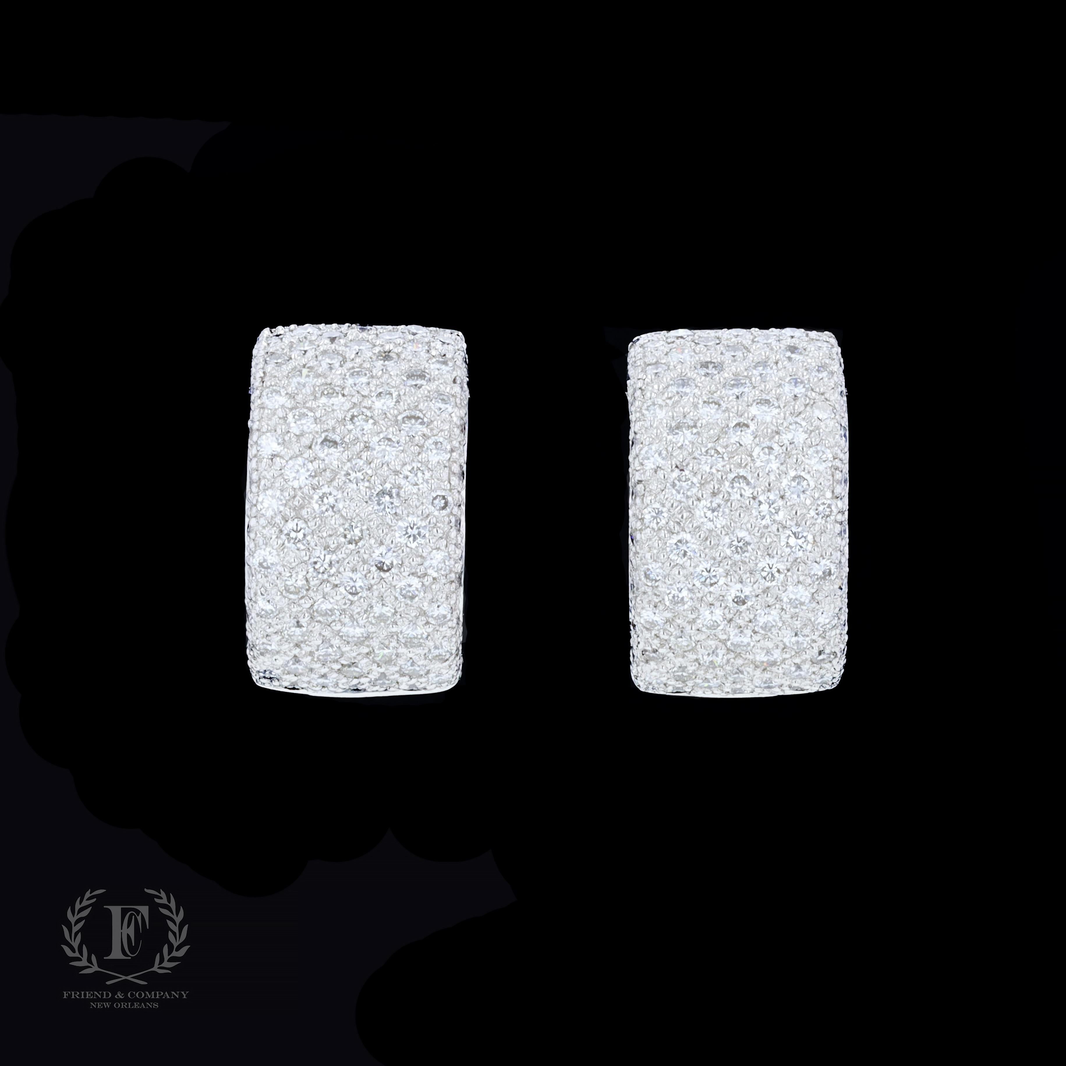 The glamorous diamond earrings feature round cut diamonds that weigh approximately 2.00 carats. The color of the diamonds is G and the clarity is VS. They also feature secure lever-back closures. The earrings measure 16mm by 10mm and weigh 15.8