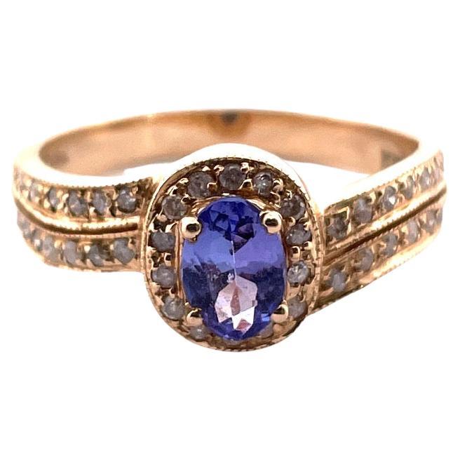 Sparkling 14k Yellow Gold Tanzanite and Diamond Ring For Sale