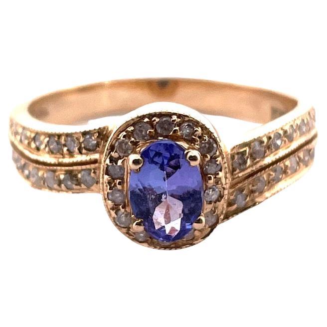 Sparkling 14k Yellow Gold Tanzanite and Diamond Ring