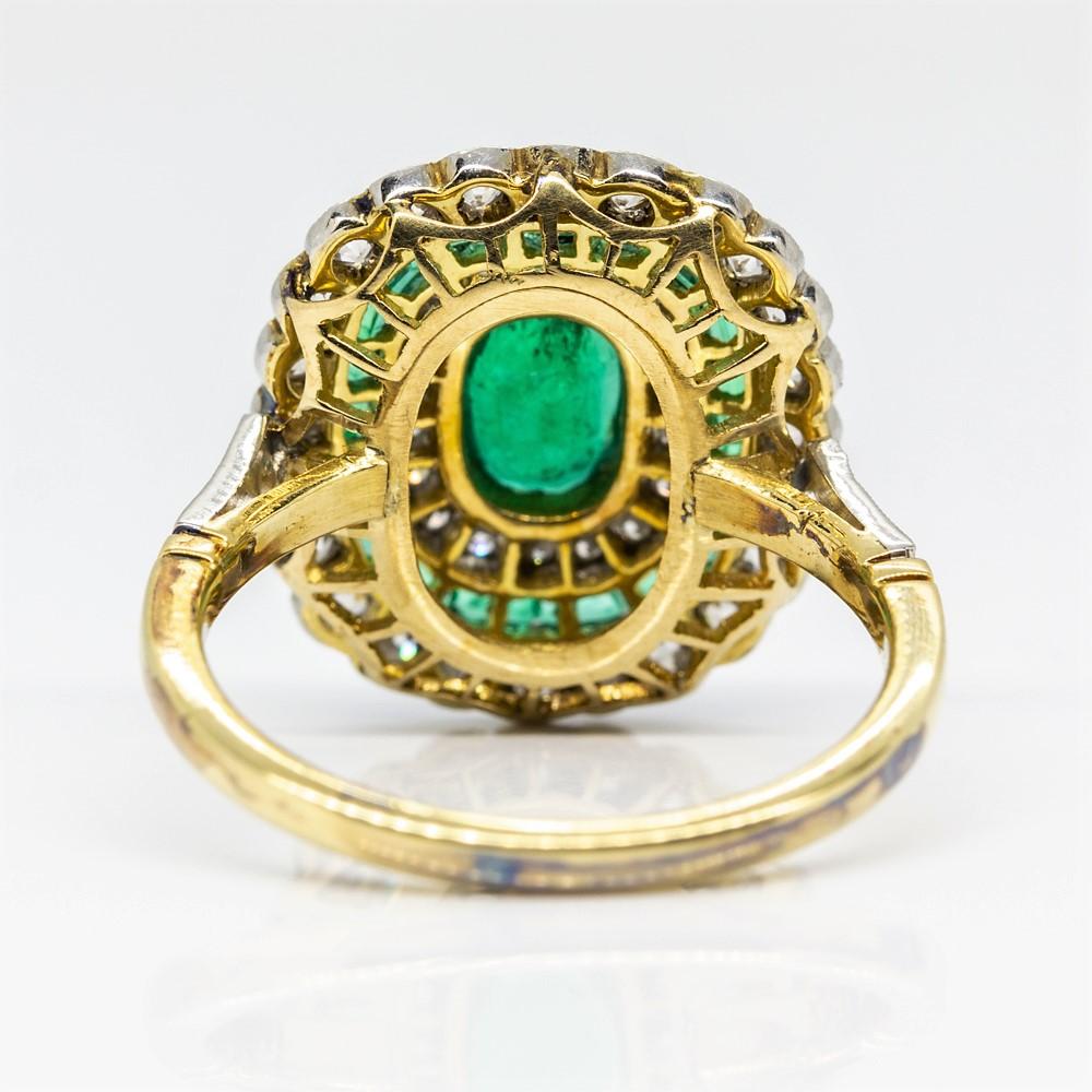 Art Deco Sparkling 18 Karat Gold and Platinum Diamonds and Emeralds Ring