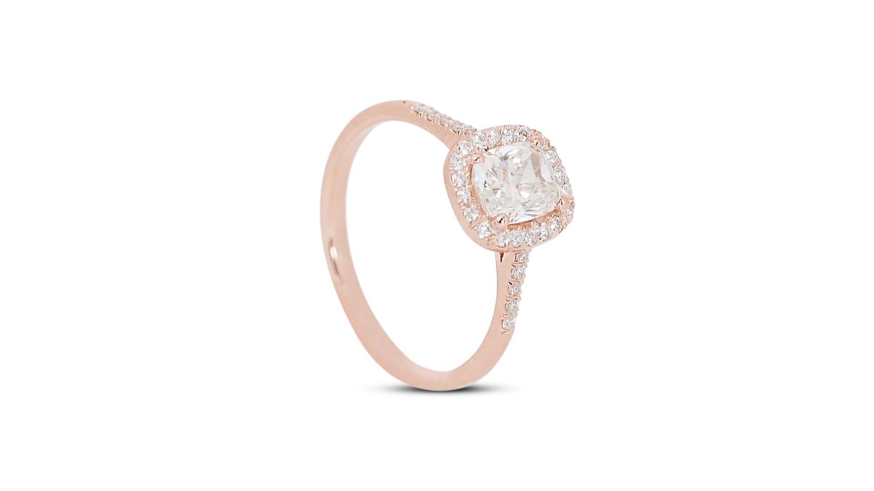 
Sparkling 18K Rose Gold Natural Diamond Halo Ring w/1.69 Carat

A captivating diamond halo ring featuring a 1.50 carat cushion shaped center stone. The center stone is further enhanced by a sparkling halo of 30 round brilliant cut diamonds totaling