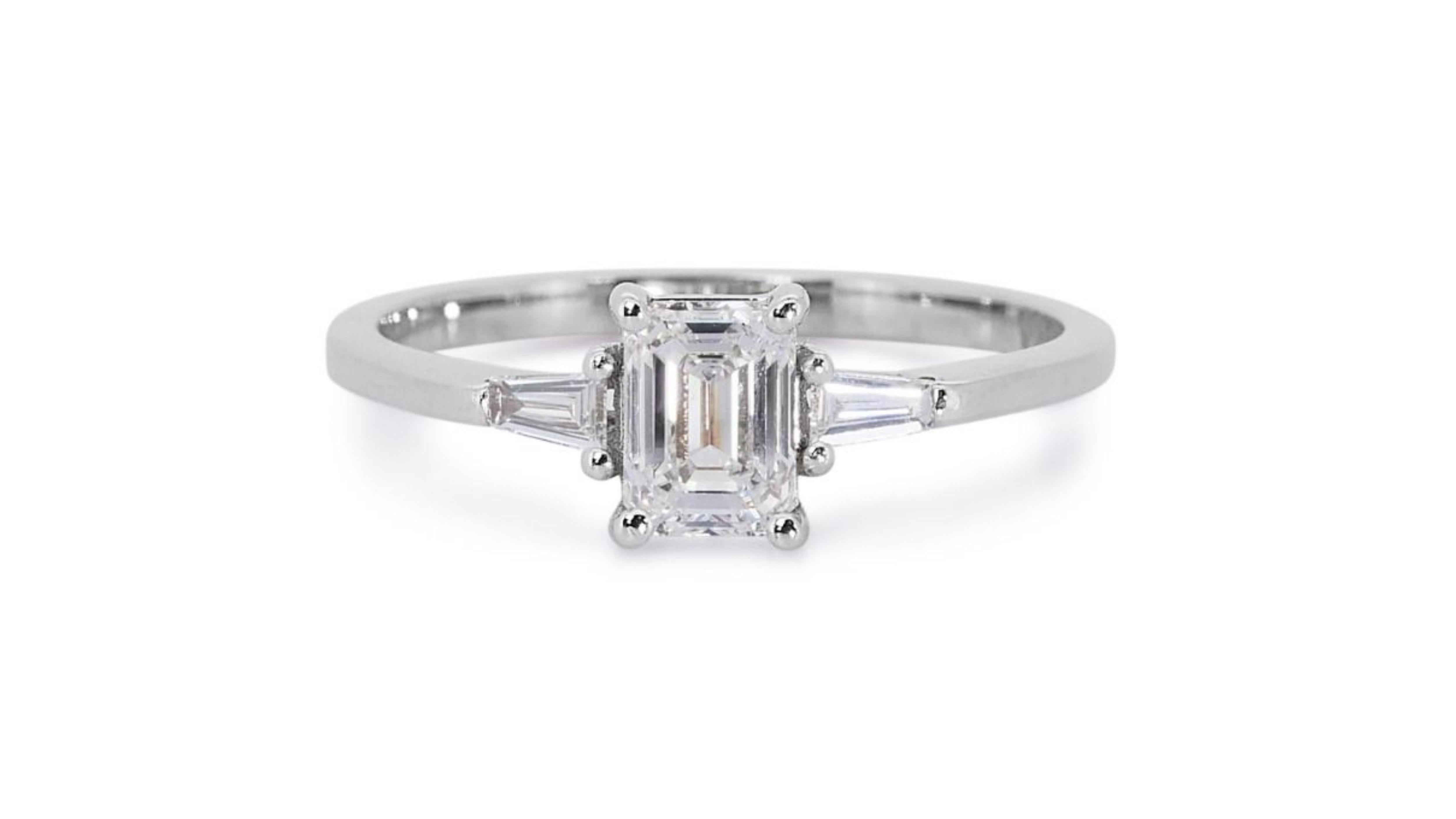 Women's Sparkling 18k White Gold .71ct Emerald Cut Three Stone Diamond Ring For Sale