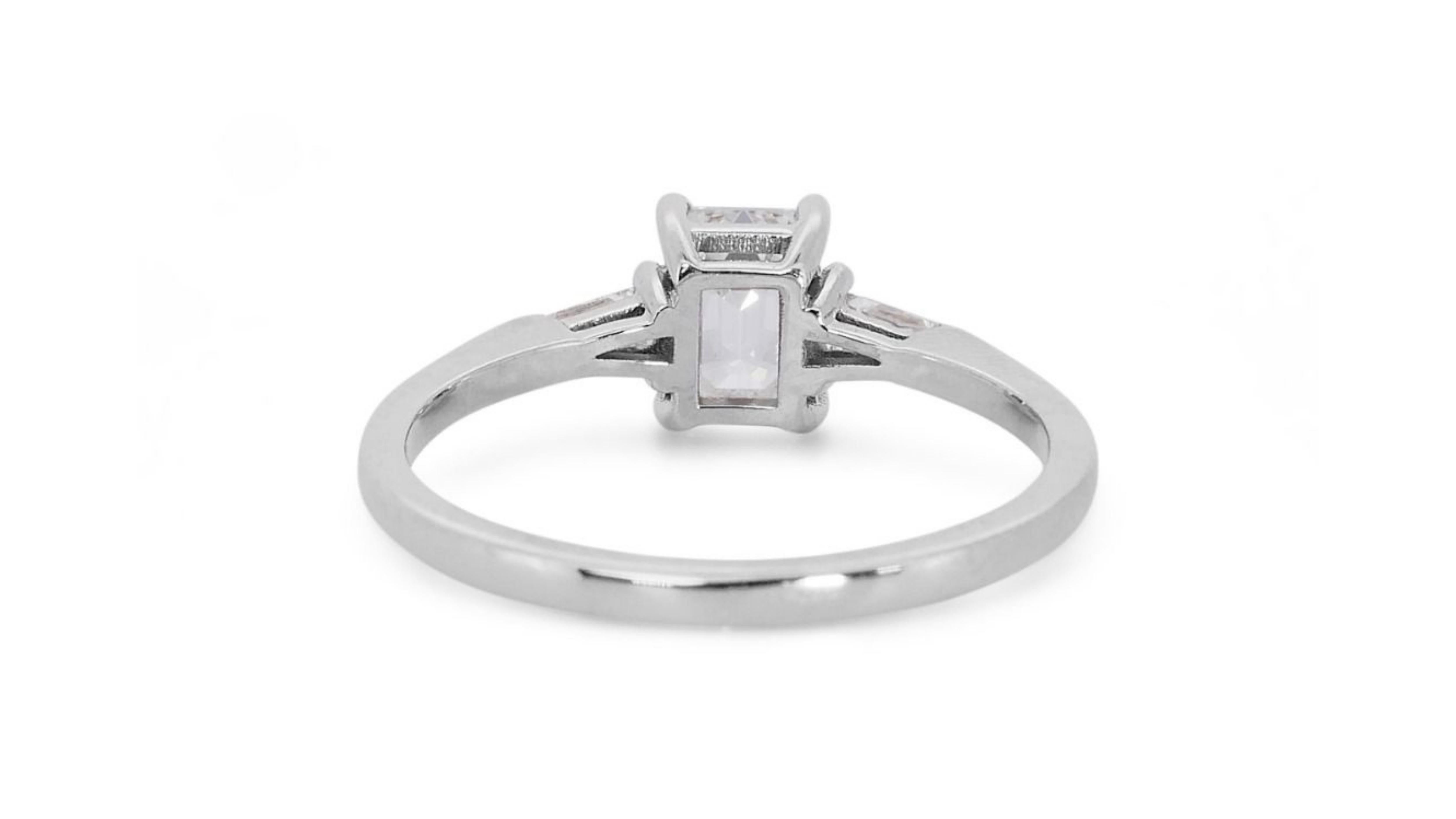 Sparkling 18k White Gold .71ct Emerald Cut Three Stone Diamond Ring For Sale 3