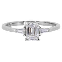 Sparkling 18k White Gold .71ct Emerald Cut Three Stone Diamond Ring