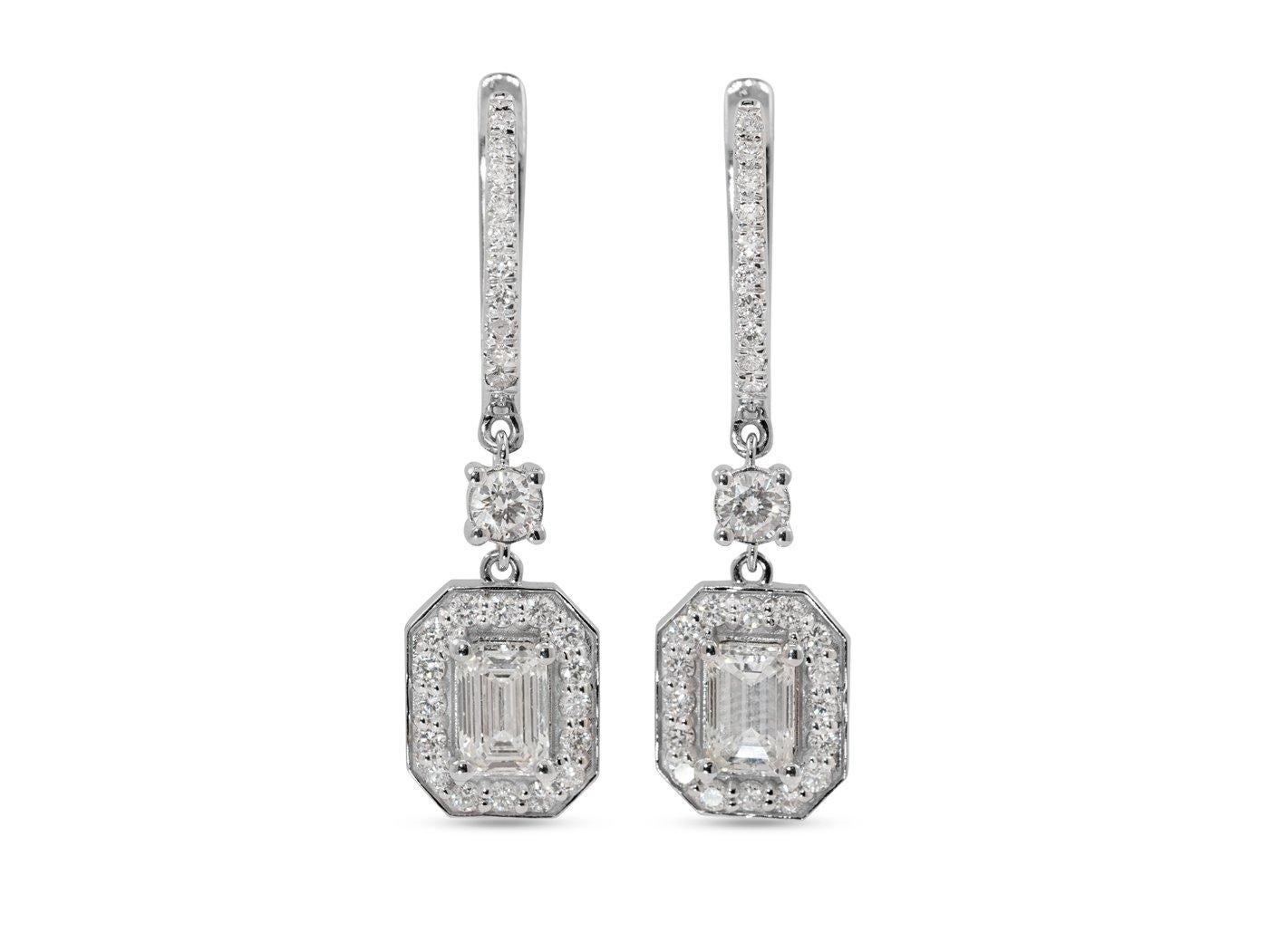Stunning drop earring made from 18k white gold with 1.50 total carat of emerald cut diamond. This diamond comes with an GIA Certificate and a fancy box.

-2 diamond main stone of 0.50 ct. each, total: 1.00 ct.
Cut: Emerald
Color: H
Clarity: VVS1
Cut