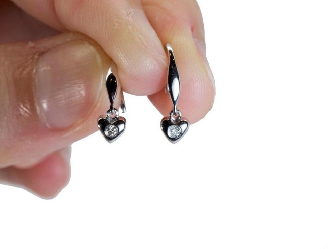 Women's Sparkling 18K White Gold Diamond Earrings with 0.06 ct Natural Diamonds For Sale