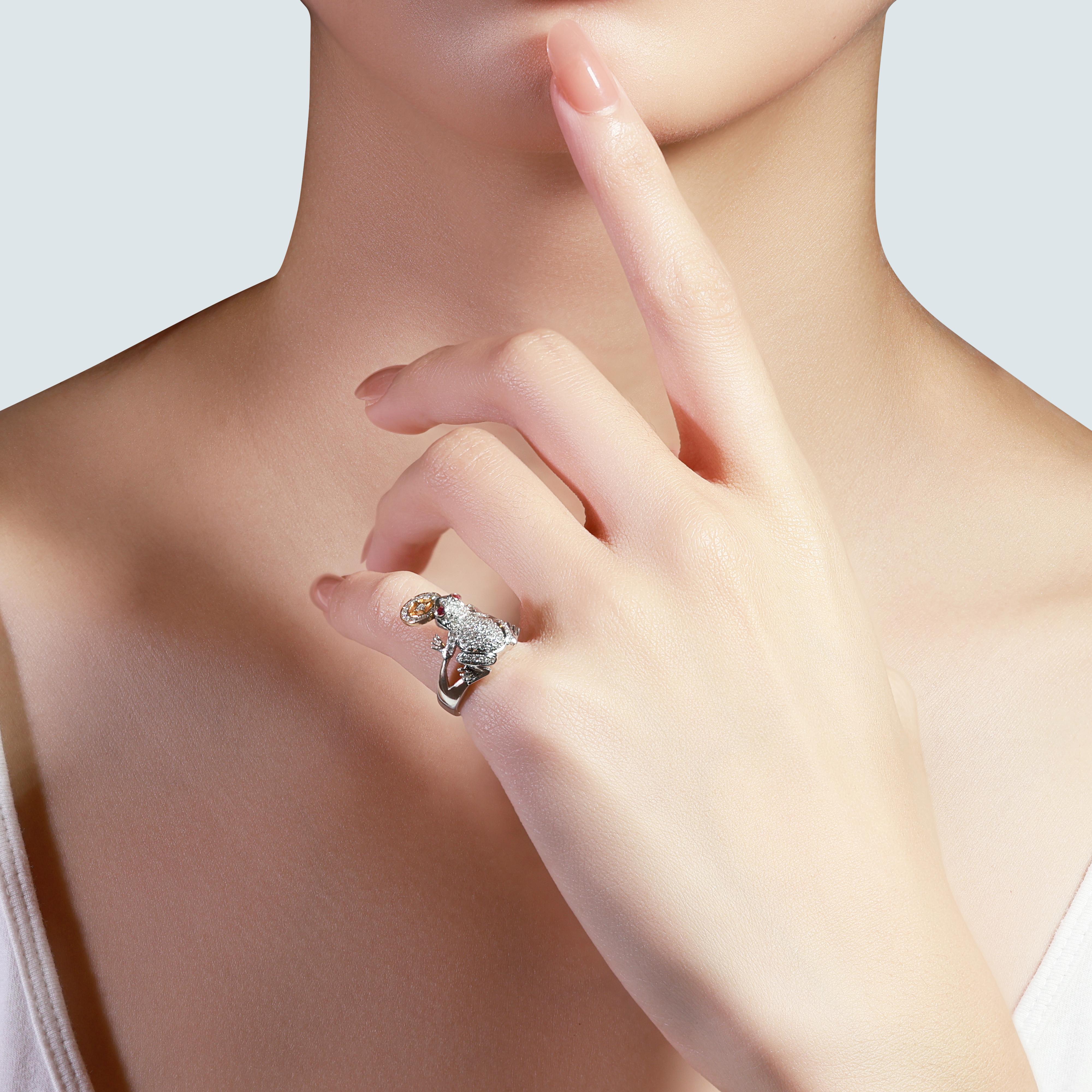 A beautiful frog ring with a dazzling 0.04 carat round brilliant natural ruby. It has 0.35 carat of side diamonds which add more to its elegance. The jewelry is made of 18k white gold with a high quality polish. It comes with a fancy jewelry box.

2
