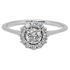Sparkling 18k White gold Halo Ring with 0.65 ct Natural Diamonds AIG Certificate