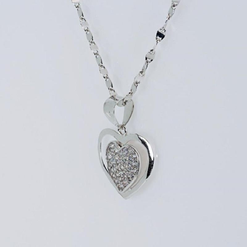 Beautiful 18k white gold necklace

Stones present on the heart pendant are crystals, NOT diamonds

measurements: length of chain: 440mm, width of heart pendant: 18.45mm, length of heart pendant: 16.80mm, thickness of heart pendant: 1.88mm
jewelry