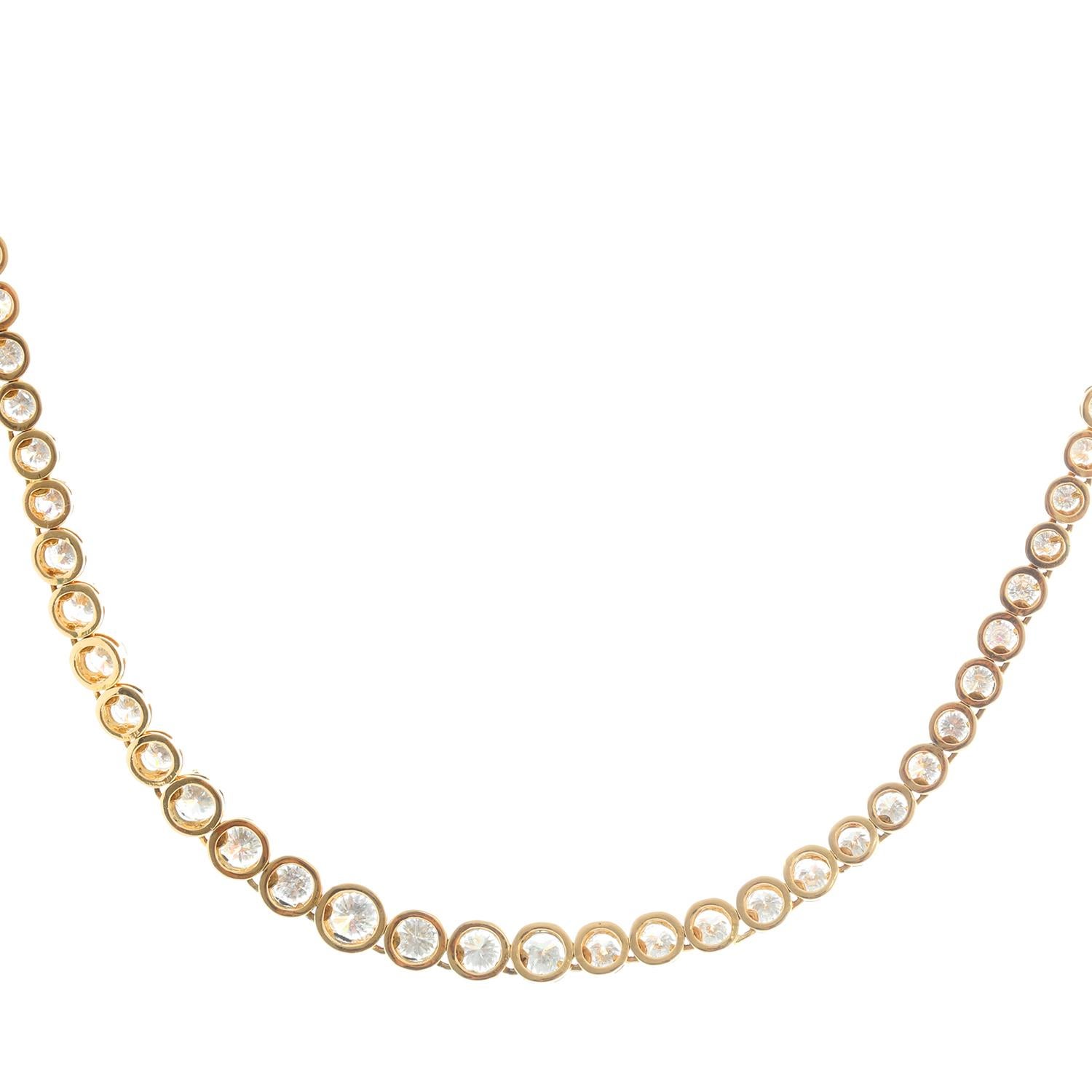Sparkling 18K Yellow Gold Diamond Necklace - This sparkling necklace features 10 ctw. round-cut brilliant diamonds set in 18k yellow gold. Gradually increasing diamonds  Necklace measures apx. 16-inches in length. Total weight is 26.6 grams. Diamond