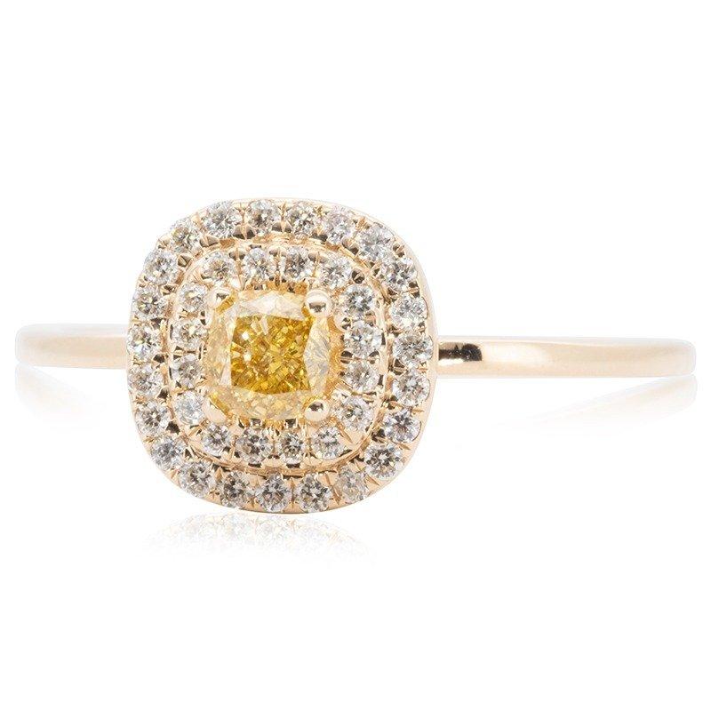 A gorgeous one of a kind Halo Ring with a dazzling 0.21 carat Cushion natural diamond. It has 0.17 carat of side diamonds which add more to its elegance. The jewelry is made of 18K Yellow with a high-quality polish. It comes with an AIG certificate
