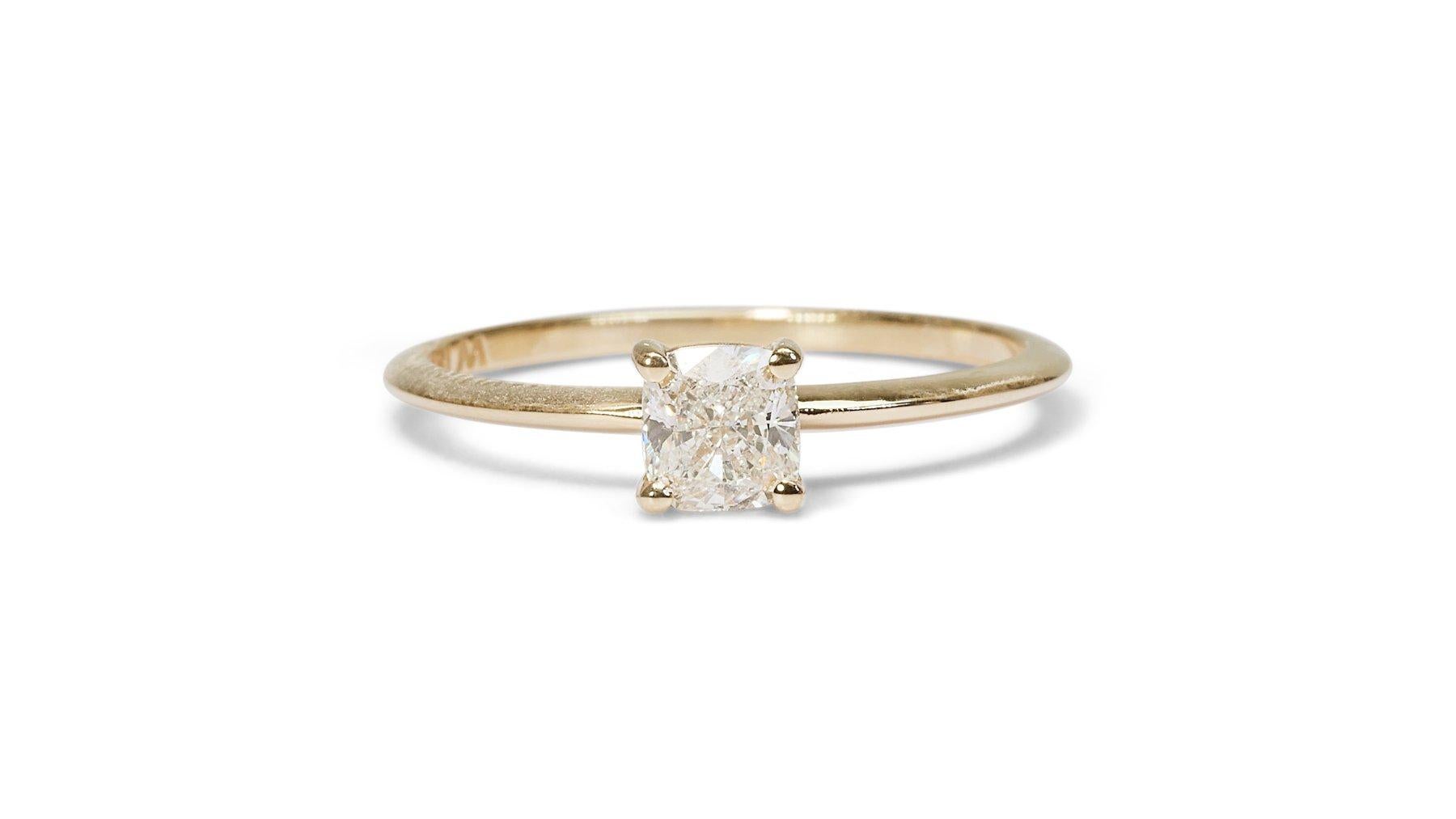 Sparkling 18K Yellow Gold Ideal Cut Solitaire Diamond Ring w/0.90ct - GIA Certified 

This exquisite ring features a captivating 0.90 carat diamond, meticulously cut in a modified brilliant style. 
The warmth and timeless elegance of 18K yellow gold