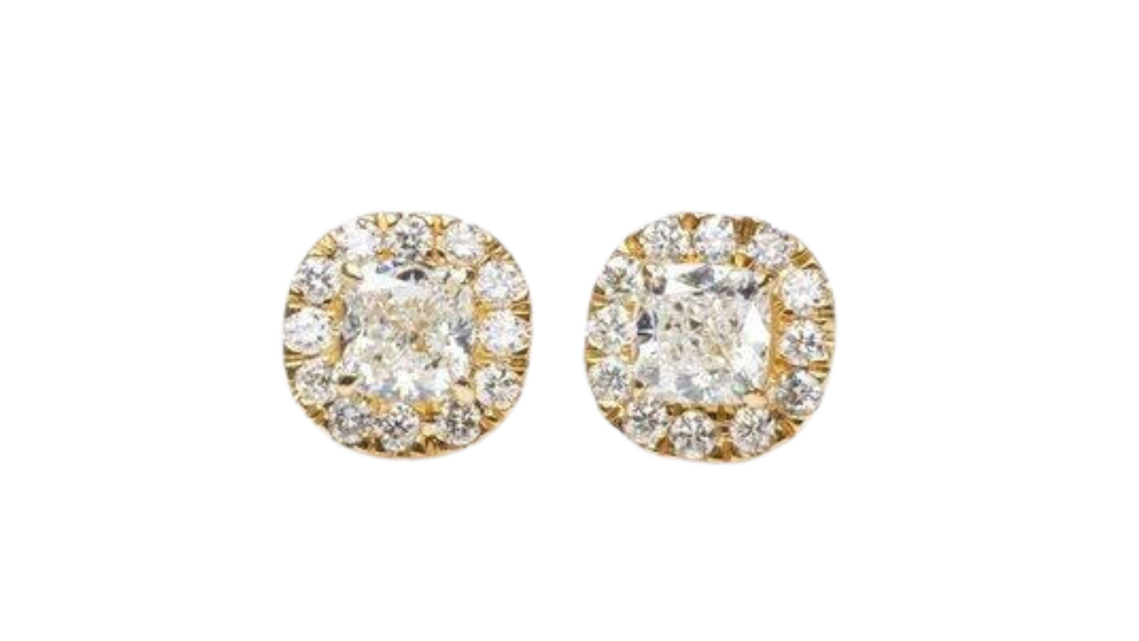 A beautiful pair of classic stud halo earrings with a dazzling pair of 1.01 carat cushion shape natural diamond in G VVS1 and 0.26 carat of round brilliant diamonds to complement the elegance of the jewelry. The jewelry is made of 18K yellow gold