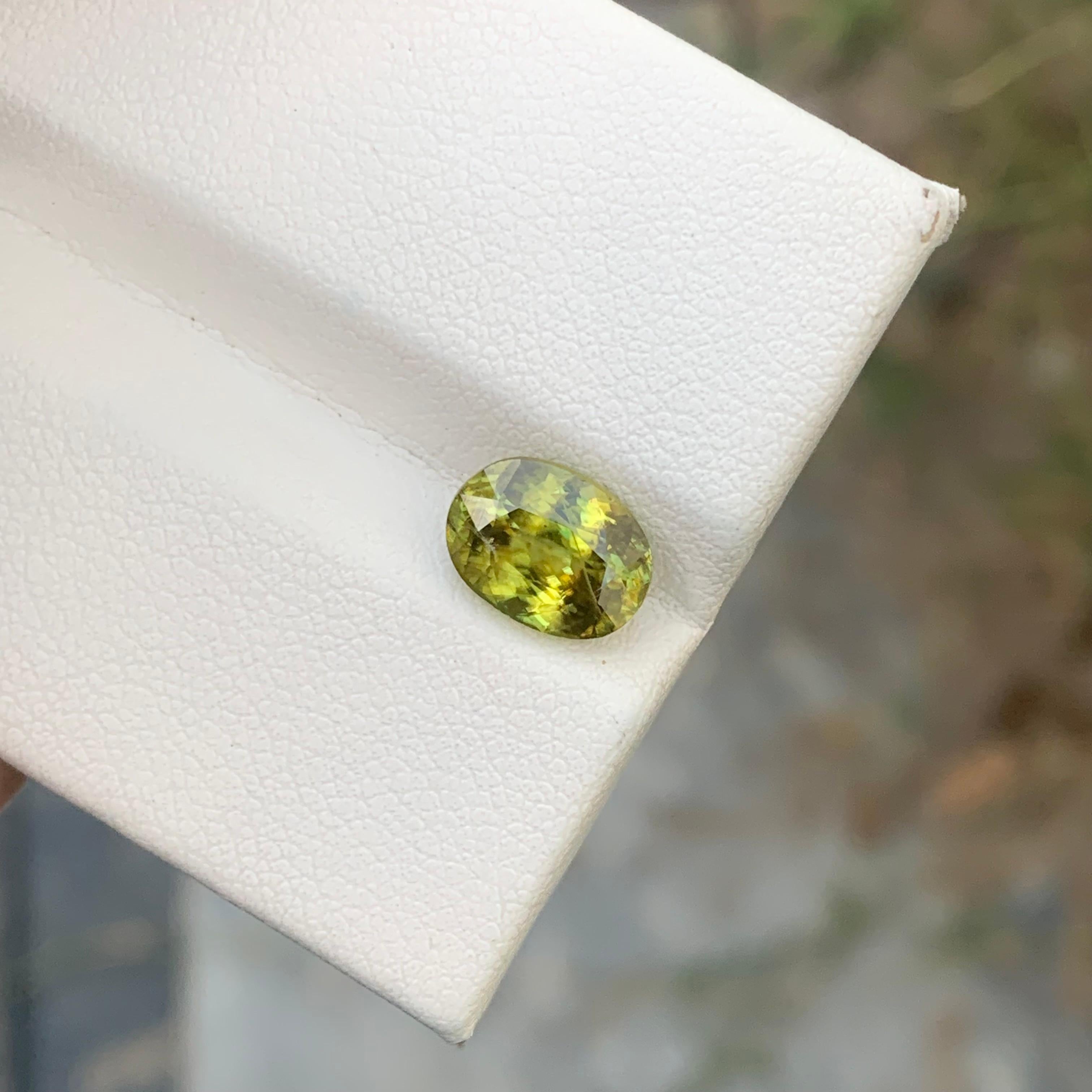 Loose Sphene 
Weight: 2.50 Cara
Dimension: 9.2x6.9x5 Mm
Origin: Warsak Pakistan 
Shape: Oval
Treatment: Non
Color: Yellow Fire 
Certificate: On Client Demand
Sphene, also known as titanite, is a captivating gemstone celebrated for its exceptional