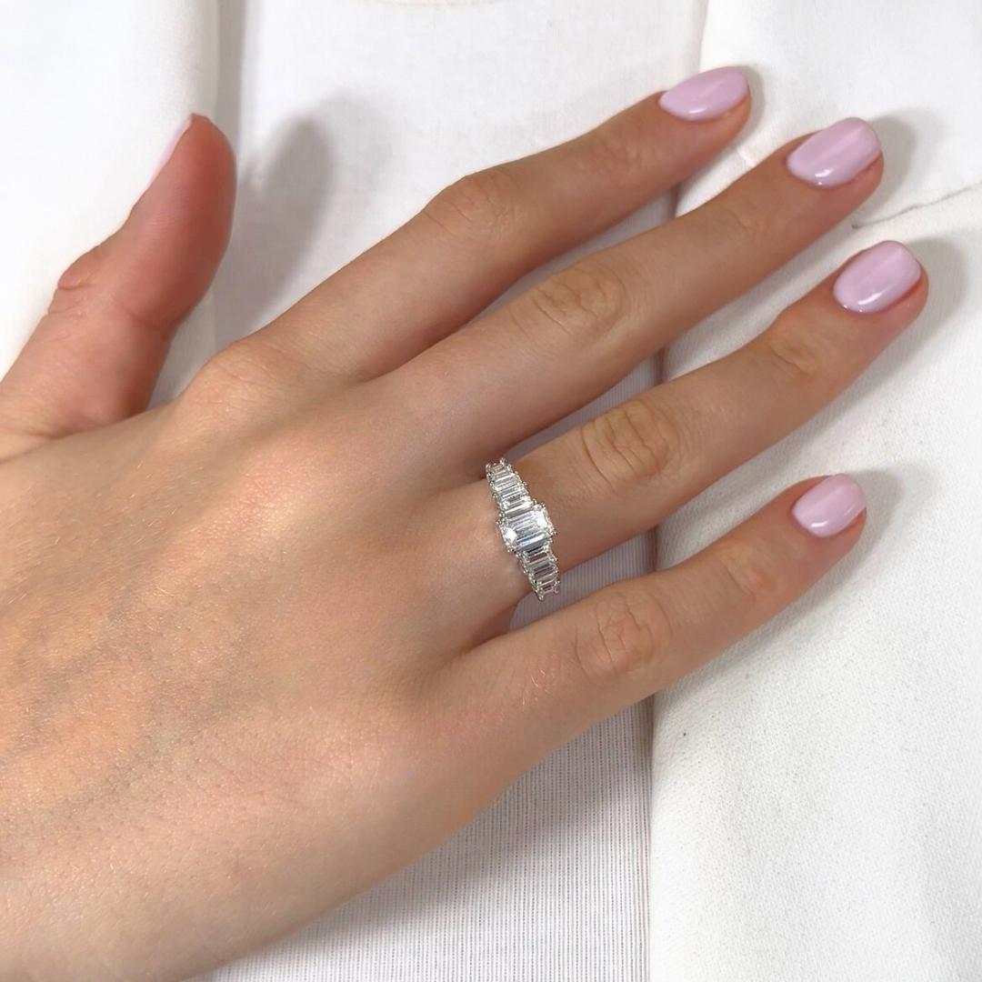 Sparkling 2.90ct Diamonds Pave Ring in 18k White Gold - IGI Certified

Sleek, structured, and endlessly radiant, this 18k white gold ring is a masterpiece of modern sophistication. At its, center is a breathtaking 1.81ct emerald-cut diamond - an