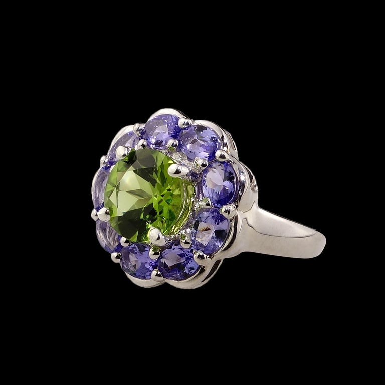 Gemjunky Sparkling Ring of Green Peridot in Tanzanite Halo Sterling