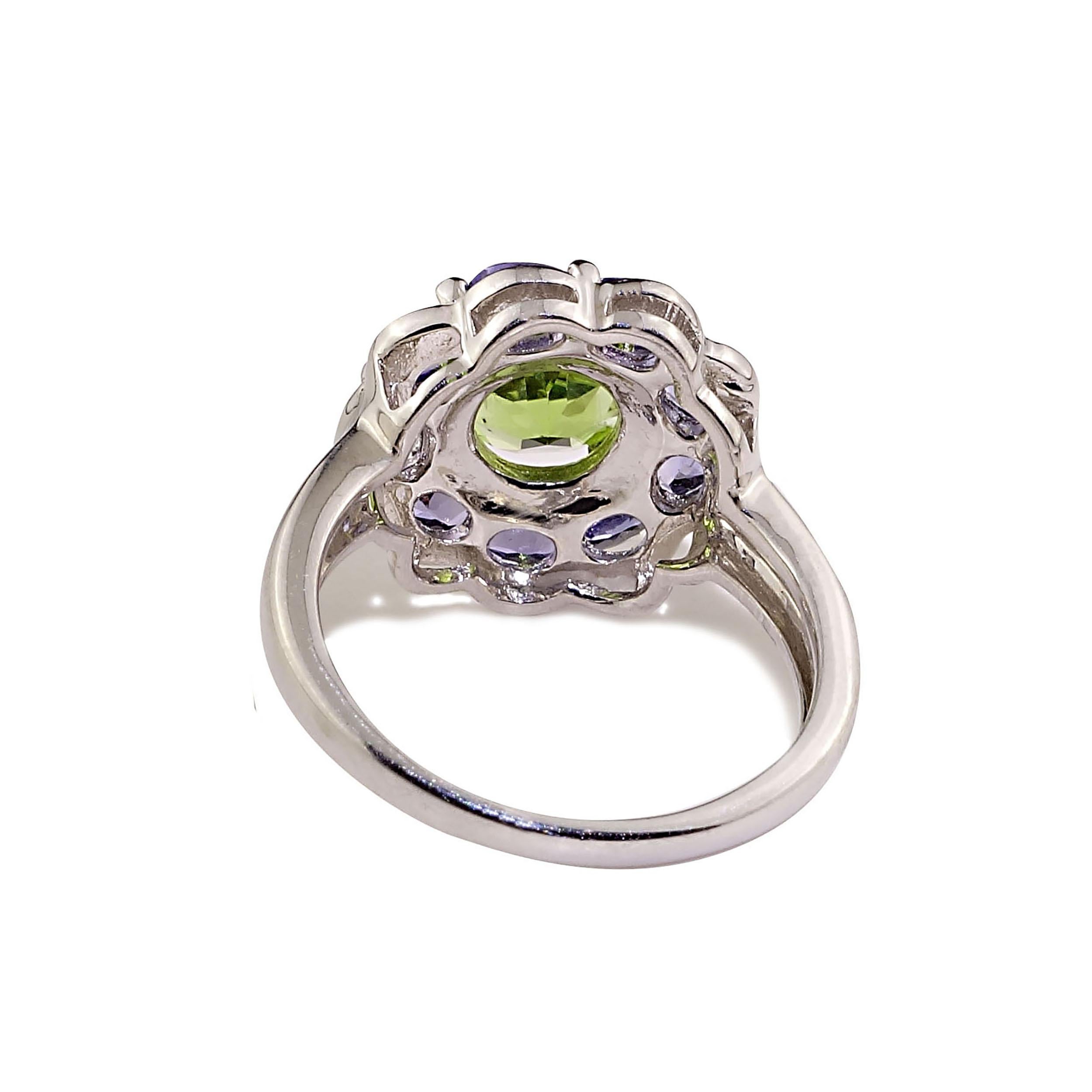 Artisan AJD Sparkling Ring of Green Peridot in Tanzanite Halo Sterling Silver For Sale