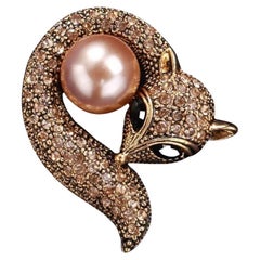 Sparkling Crystal Golden Fox enveloping a Faux Pearl Brooch Pin