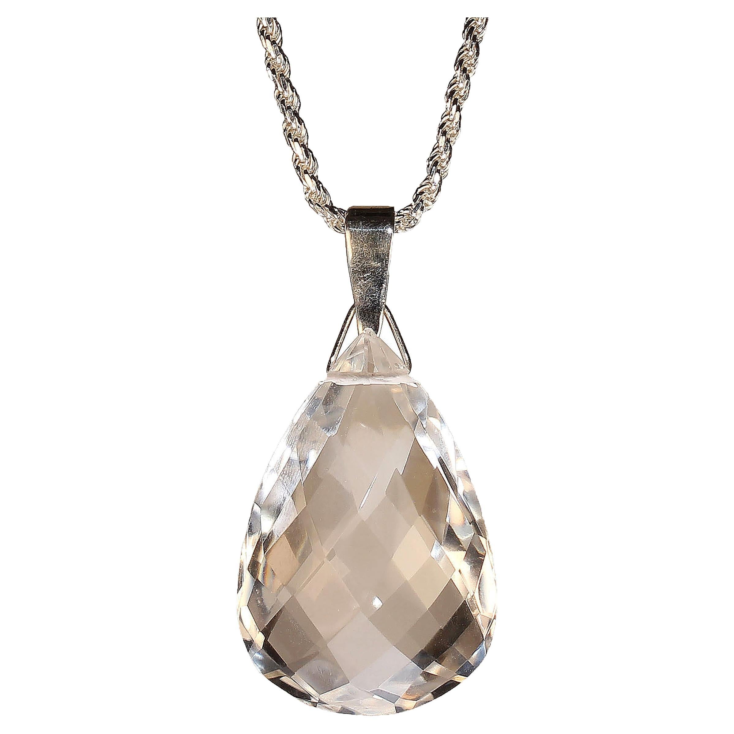 This sparkling fancy cut Quartz Crystal and Sterling Silver pendant is just what you need for summer. This gorgeous quartz crystal is supposed to be an amplifying stone which means that whatever you put into it, it will return many times. Think of