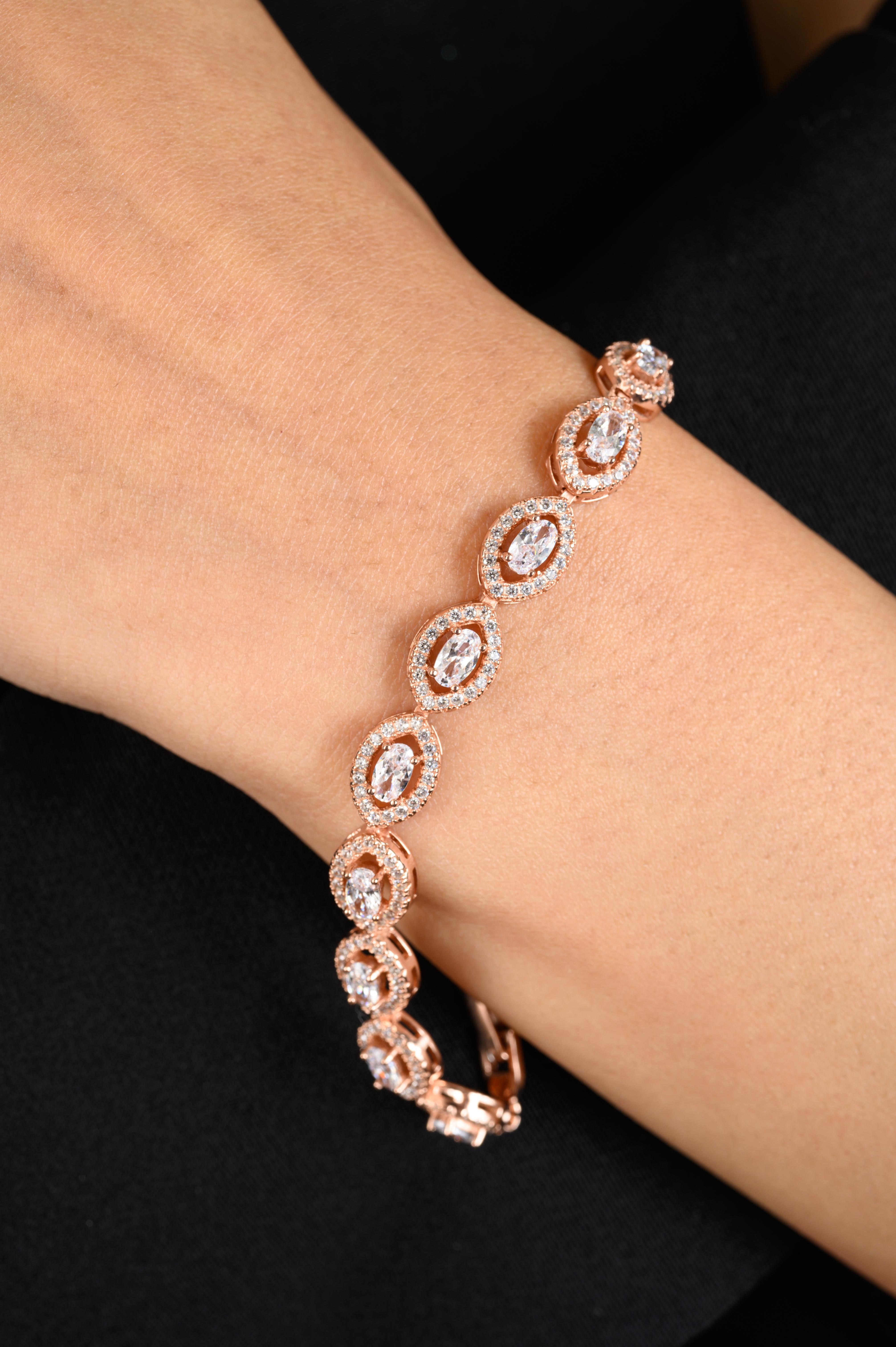 Sparkling Oval Cut Cubic Zirconia Tennis Bracelet in sterling silver. You shall need statement tennis bracelet to make a statement with your look. Each piece features dazzling cubic zirconia stones, renowned for their brilliance and clarity, set in