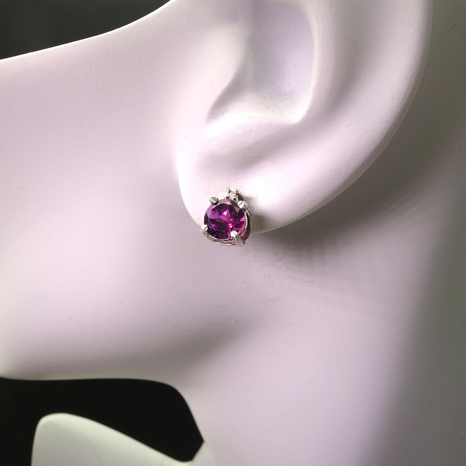 
These earrings are perfect to wear when you're teleconferencing! And, they are available for immediate shipment.
Delightful, glittering, Garnets in 6MM stud earrings with 1 point diamond accents above each garnet. These sparkling Rhodolite Garnets