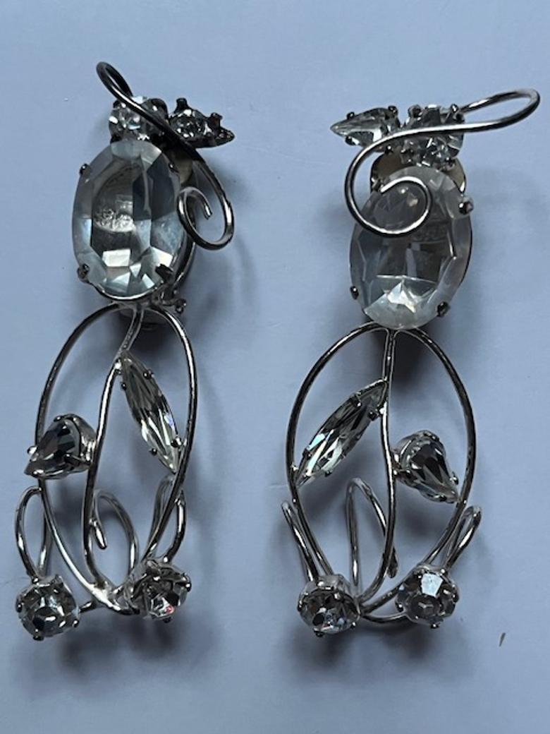 Women's Sparkling Silver Clip-on Earrings with Crystal Accents by Daniel Swarovski For Sale