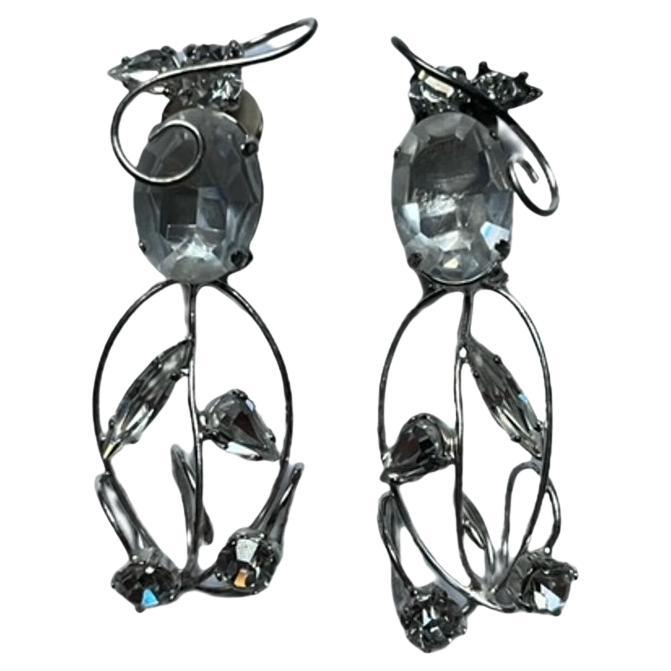 Sparkling Silver Clip-on Earrings with Crystal Accents by Daniel Swarovski For Sale