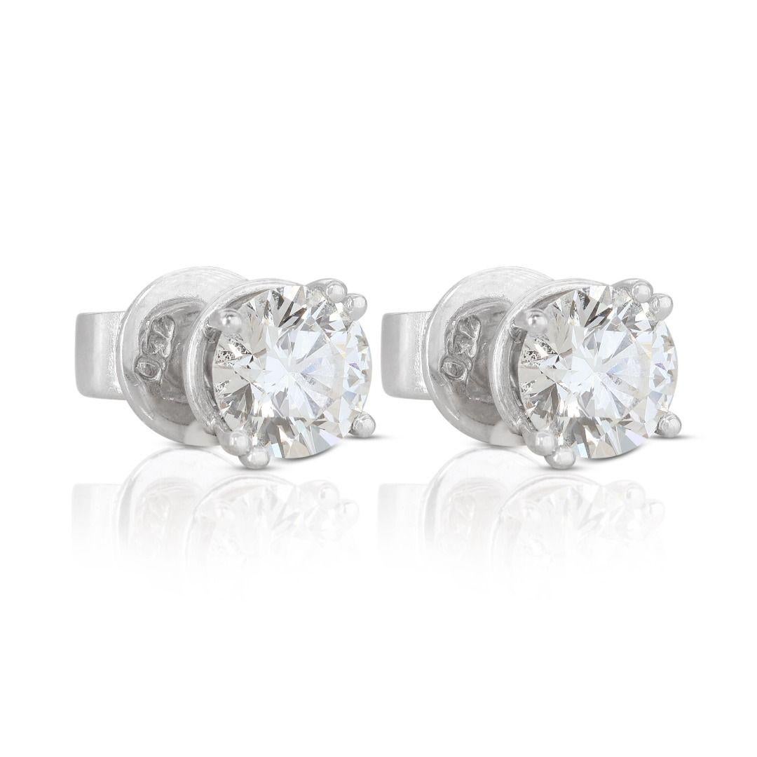Round Cut Sparkling Solitaire Stud Diamond Earrings set in 18K White Gold For Sale