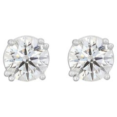 Sparkling Solitaire Stud Diamond Earrings set in 18K White Gold