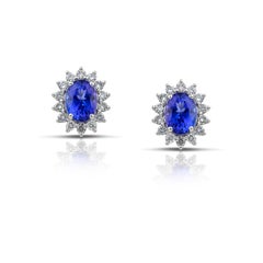 Pendientes brillantes de forma oval con tanzanita y diamantes en oro de 18 quilates