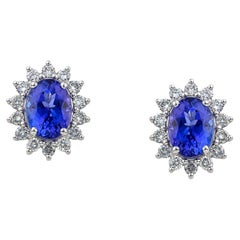 Sparkling stud earrings oval shape with Tanzanite and Diamonds in 18kt Gold