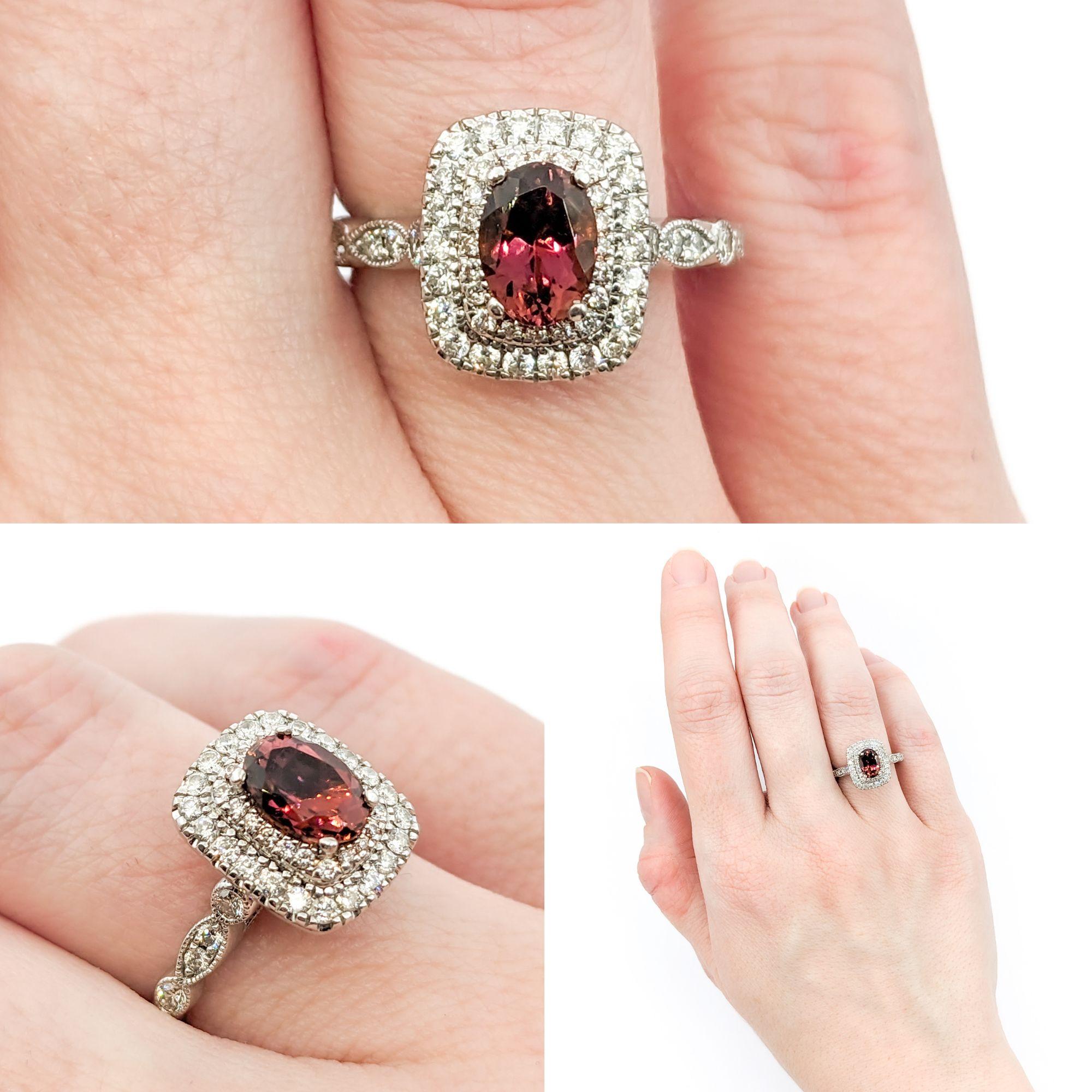 Sparkling Tourmaline & Diamond Dress Ring

This beautiful ring from Neil Lane is crafted in 14kt white gold and features a .88ct oval-cut tourmaline and .40ctw round brilliant-cut diamonds, SI1 clarity and G color. This ring is size 6 but can be