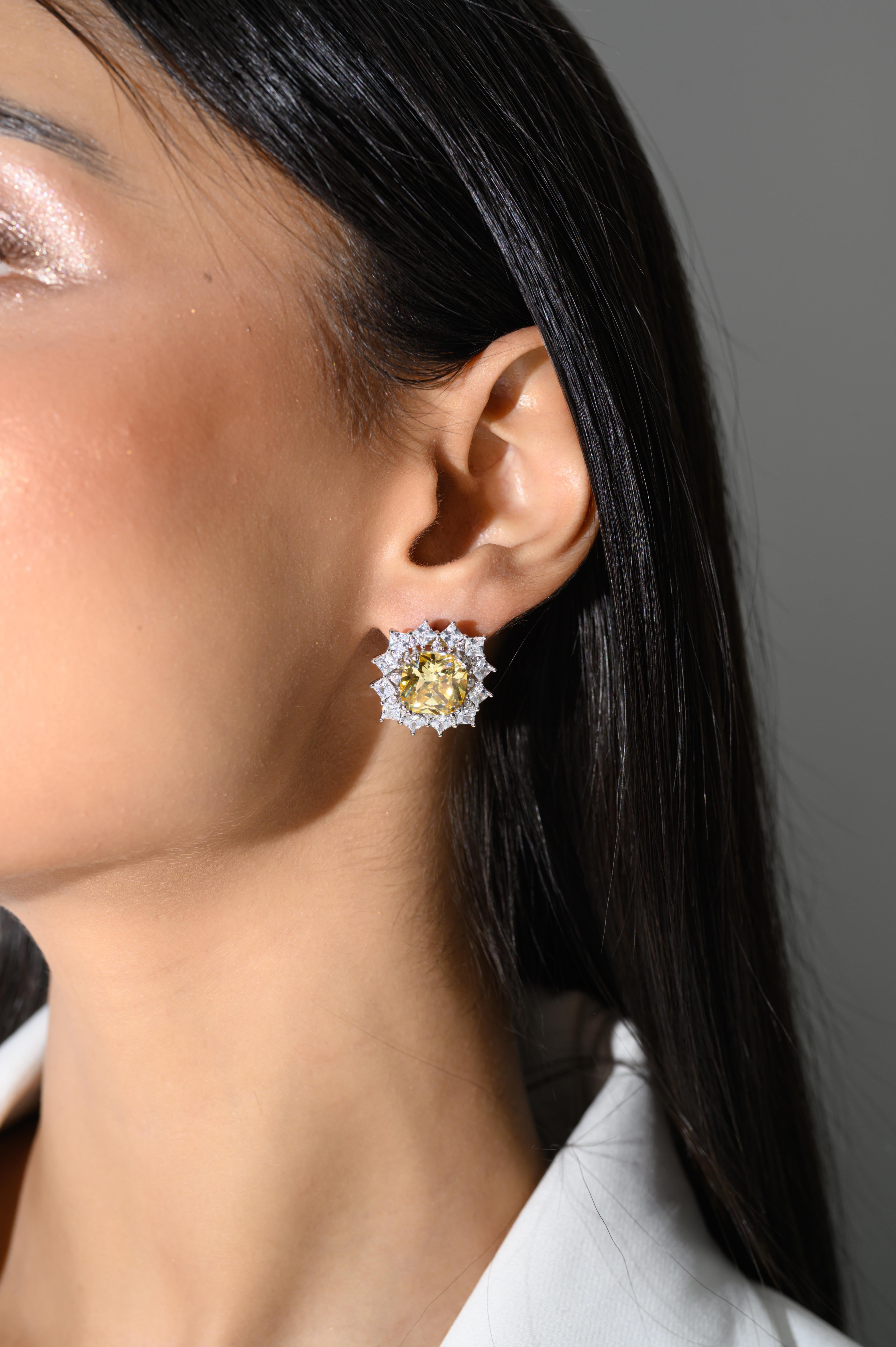 Sparkling Yellow Cubic Zirconia Engagement Studs Earring in sterling silver. You shall need these statement studs earring to make a statement with your look. Each piece features dazzling cubic zirconia stones, renowned for their brilliance and