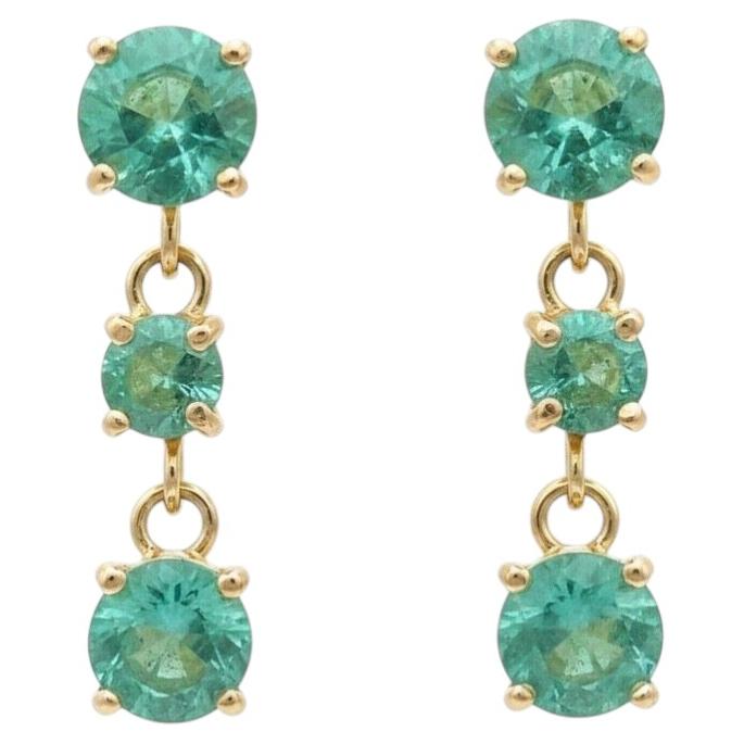 Orecchini pendenti con smeraldi zambiani scintillanti e oro 14k