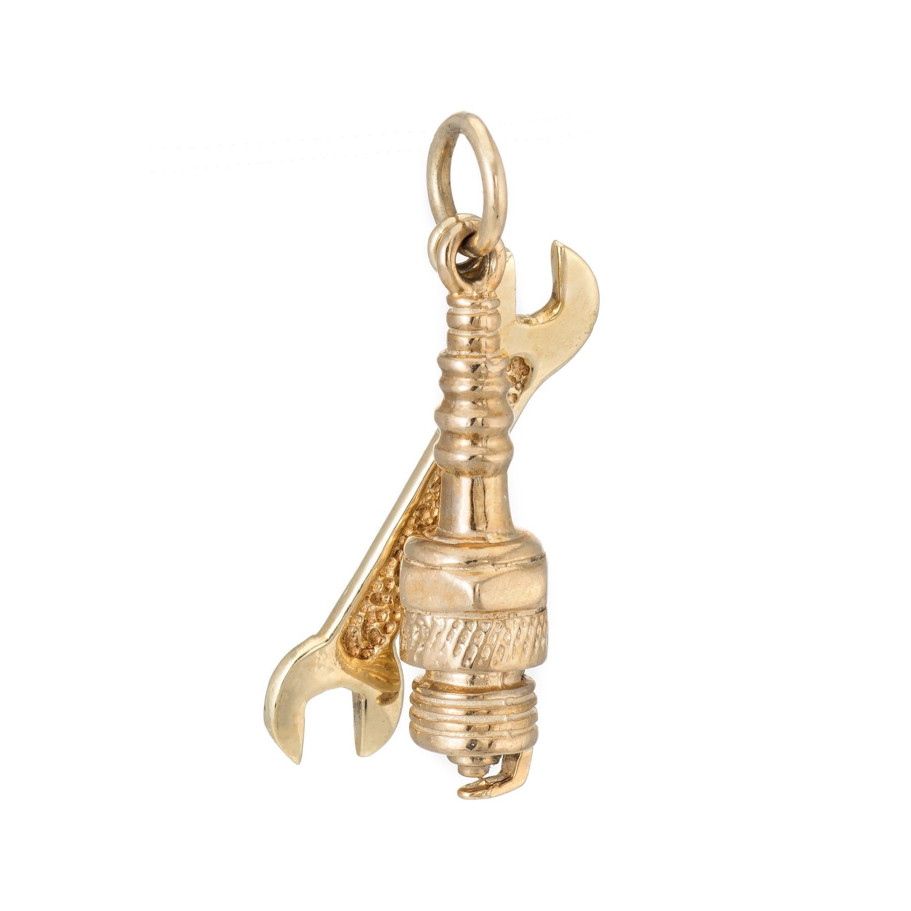 Finely detailed pair of charms, crafted in 10k yellow gold. 

A wrench and a sparkplug are rendered in lifelike detail. 

The charms are in excellent original condition.

Particulars:

Weight: 4.4 grams

Stones: N/A.

Size & Measurements: The charms