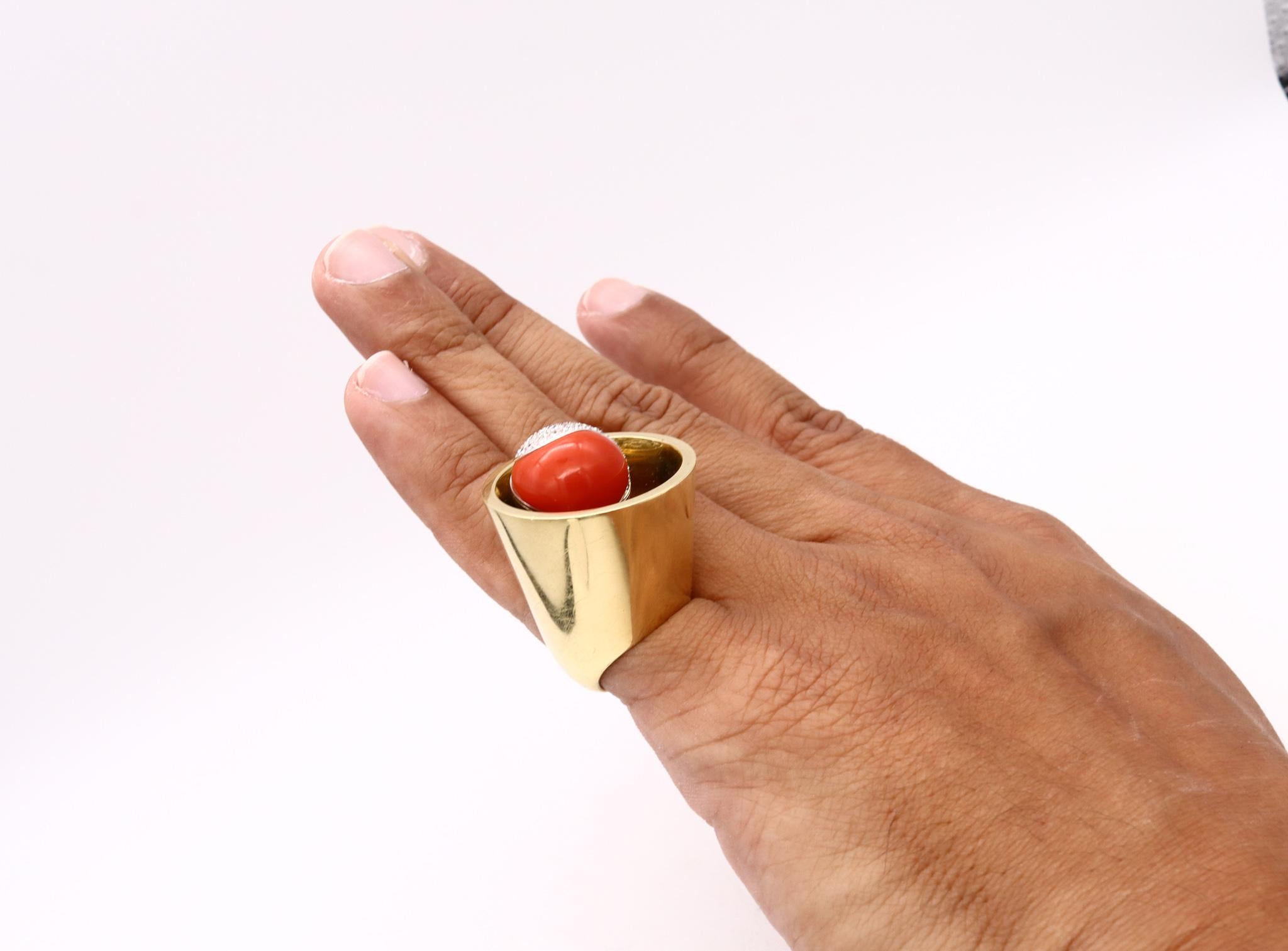 Sculptural op art Yin-Yang Ring with Gemstones.

An ultra-modern geometric piece of art from the Spatialism period, of the 1970s. This unusual and rare one-of-a-kind ring is made of 18 karat solid yellow gold with white gold details. The surfaces