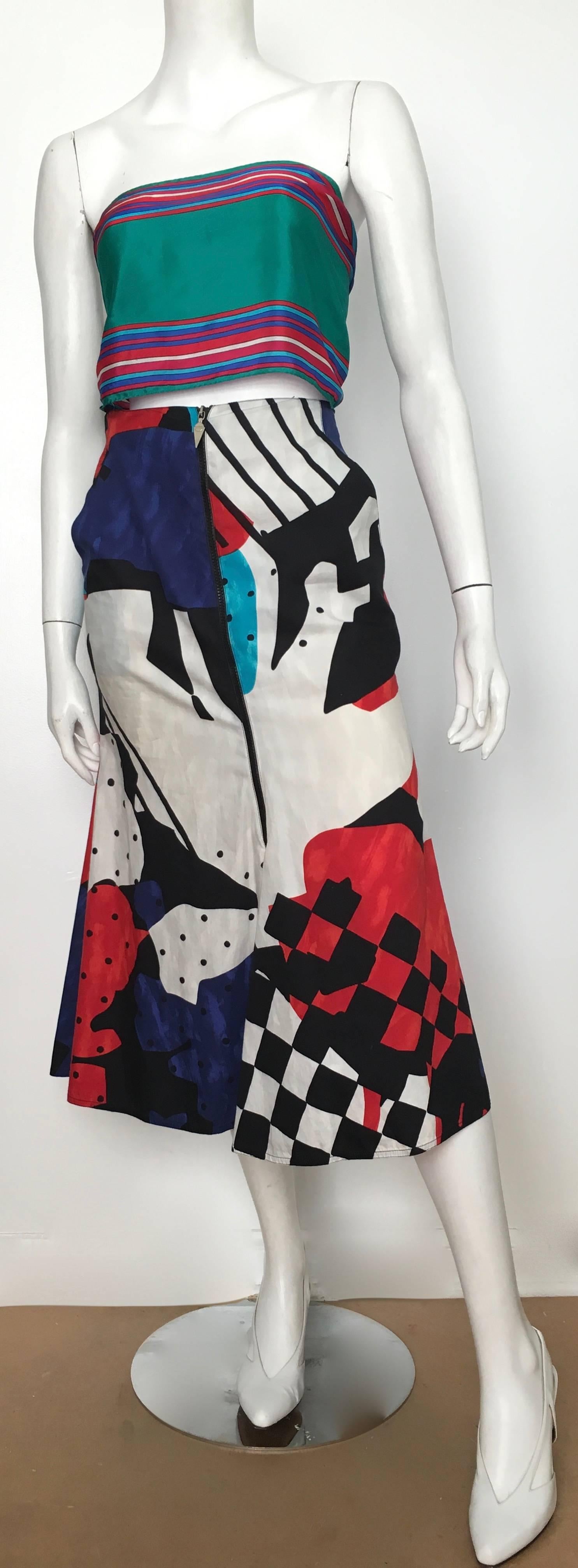 Spazio 1980s cotton mermaid skirt with a fabulous abstract pattern with pockets and front zipper is marked an Italian size 42 and will fit a size 4.  Ladies please grab your tape measure so you can measure your waistline and hips to make certain