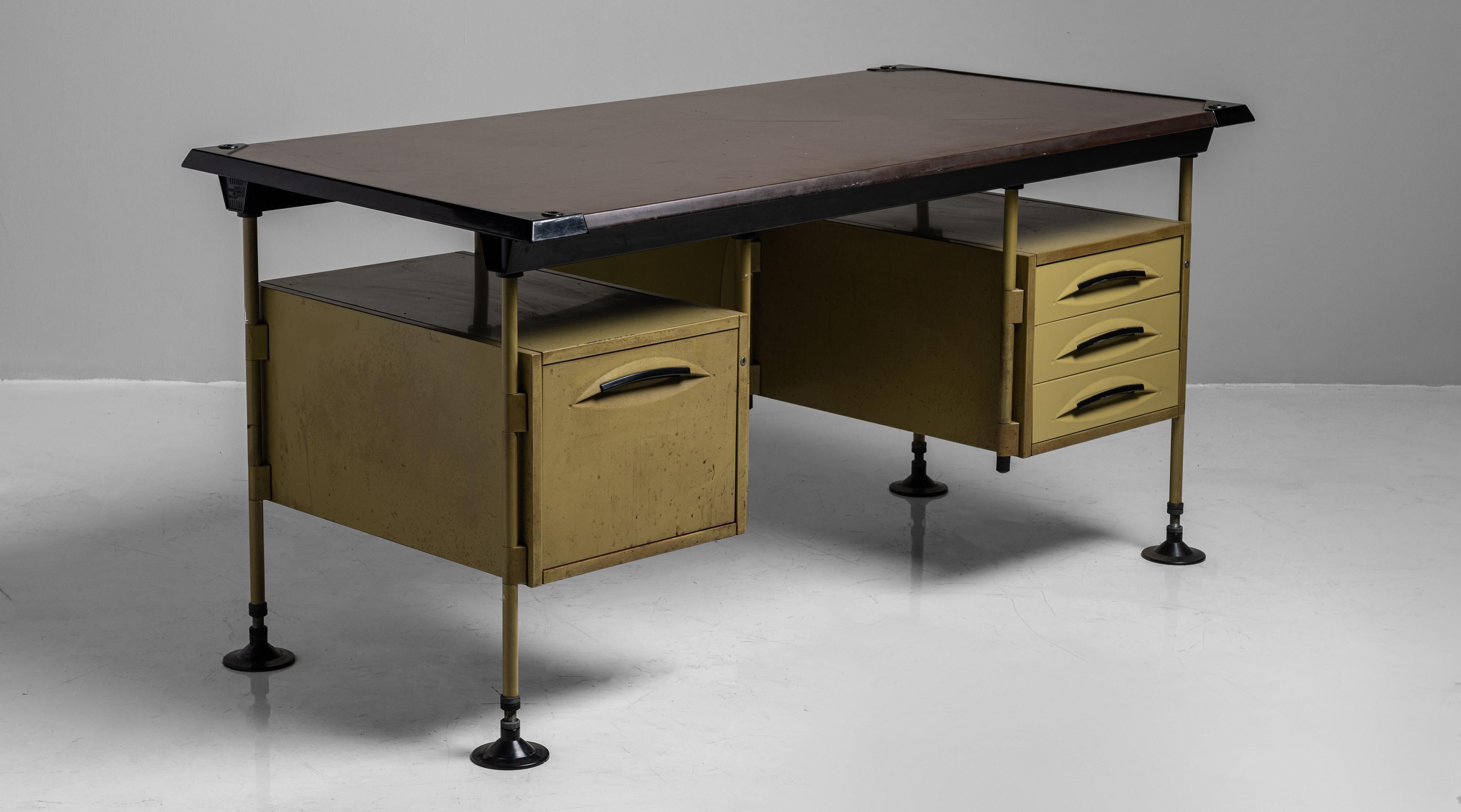 Spazio Modernista desk by Studio BBPR, Italy, 1959

Painted metal in original finish with laminated wood writing surface. Produced by Olivetti.

Measures: 62.75” W x 31.25” D x 31.25” H

    

$ 5,200.