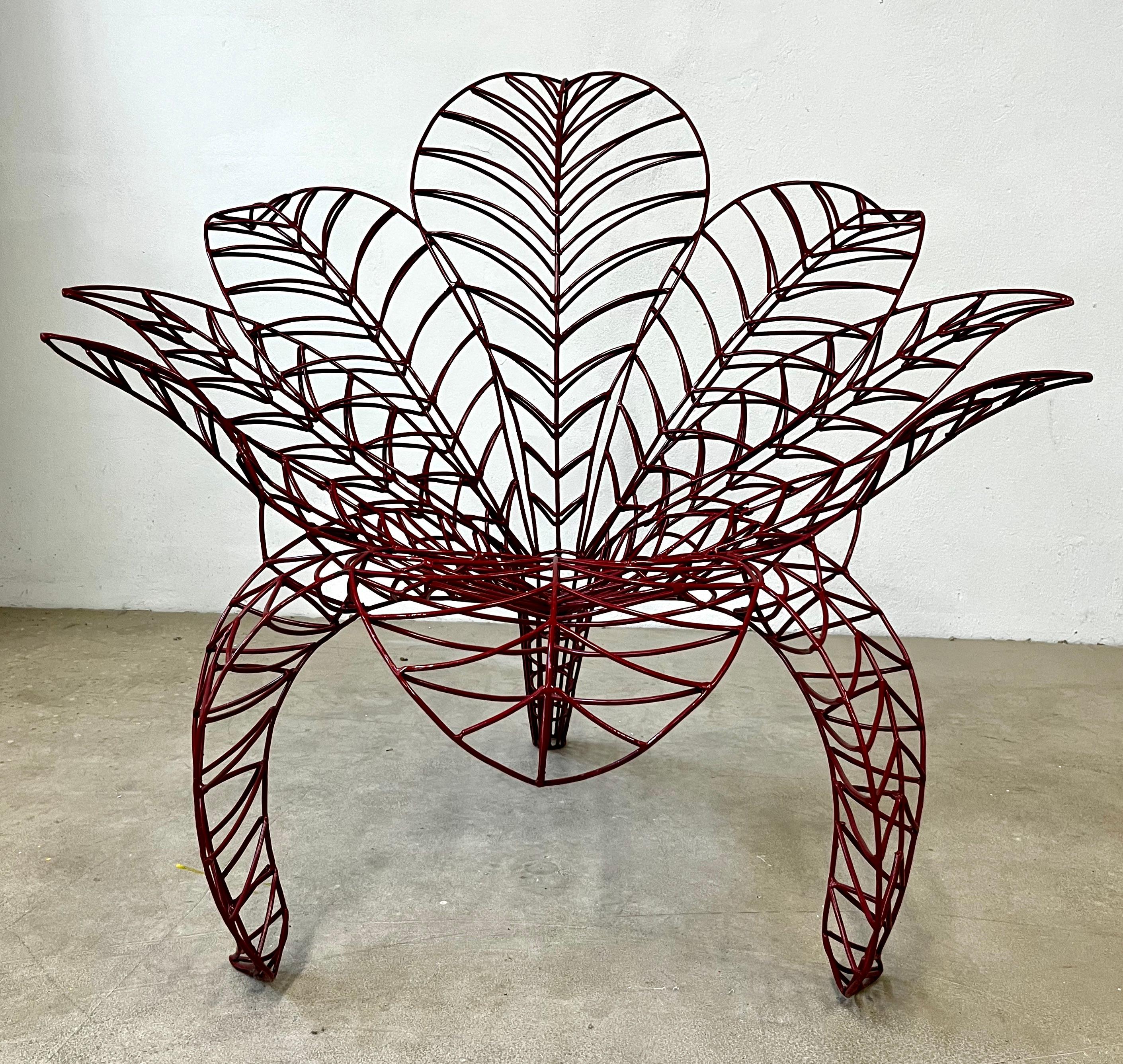 Fun minimalist armchair, a unique organic modern design inspired by nature, manufactured and signed by the Italian artist, Anacleto Spazzapan (Luino, Italy - 1943). The handmade structure in the shape of a blossoming flower is made of hand-welded