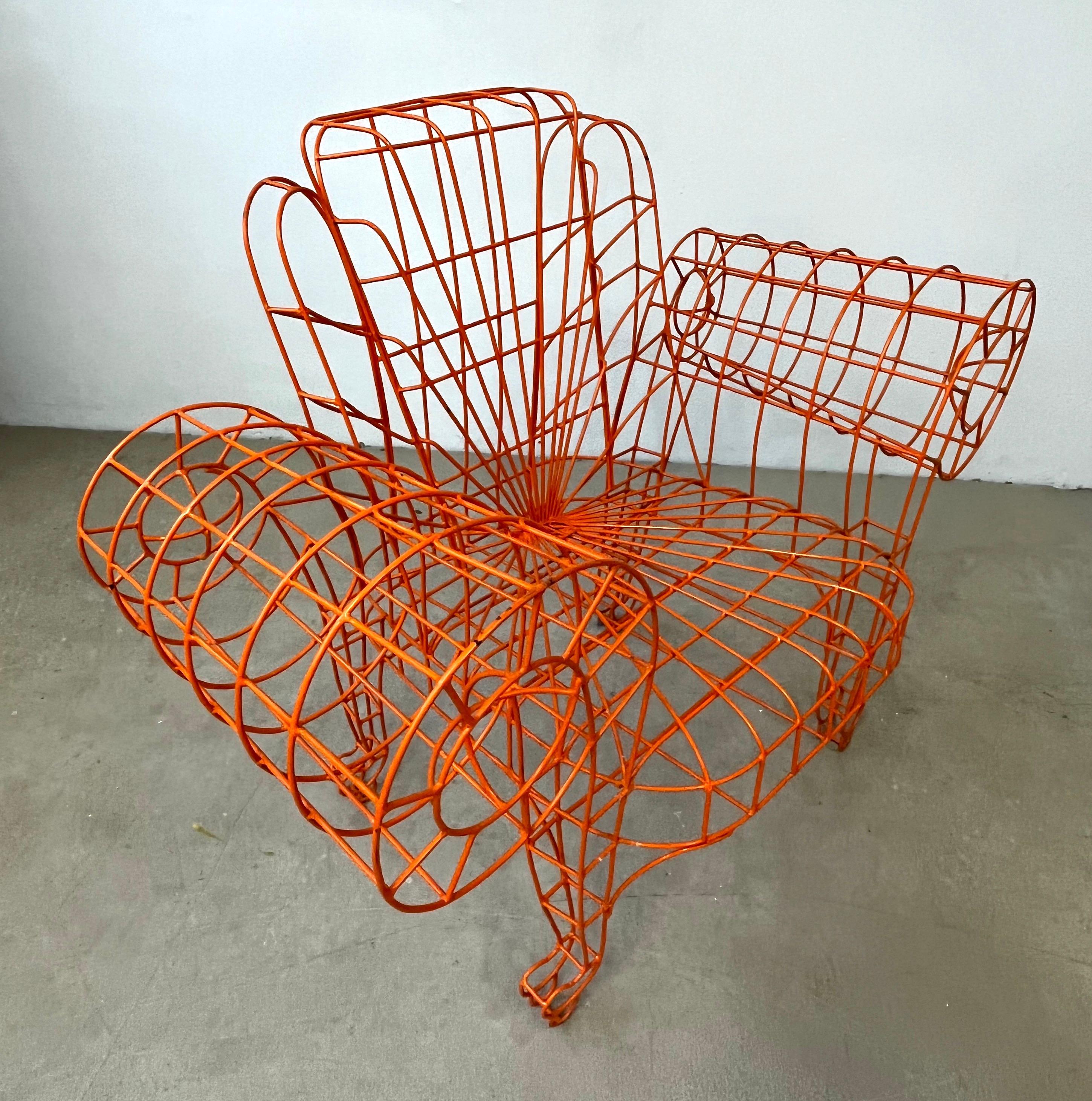 Fun minimalist armchair, a unique organic modern design, manufactured and signed by the Italian artist, Anacleto Spazzapan (Luino, Italy - 1943). The handmade structure is hand-welded thin iron tubes, typical of Spazzapan creations, cold painted in