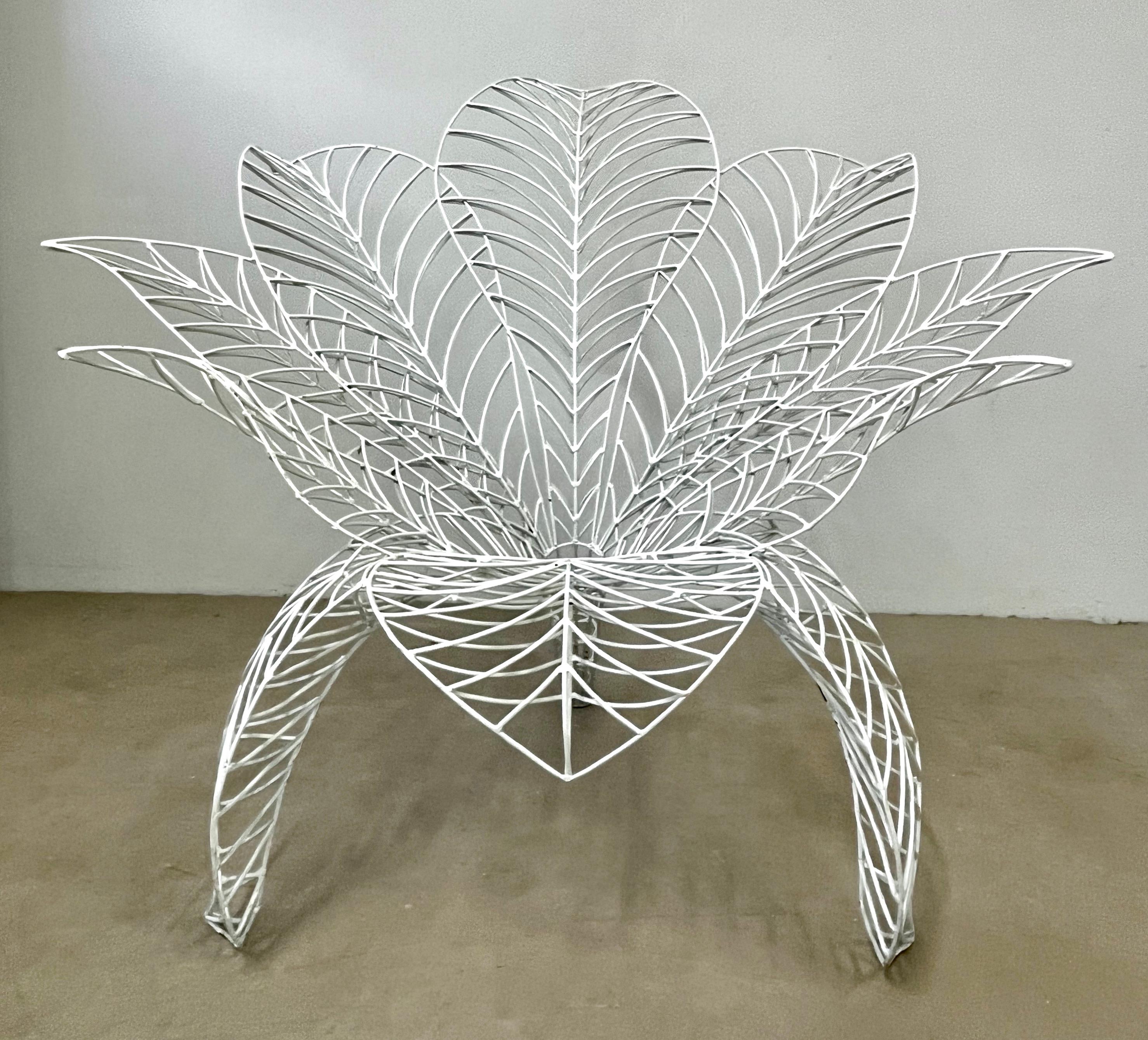 Fun minimalist armchair, a unique organic modern design inspired by nature, manufactured and signed by the Italian artist, Anacleto Spazzapan (Luino, Italy - 1943). The handmade structure in the shape of a blossoming flower is made of hand-welded